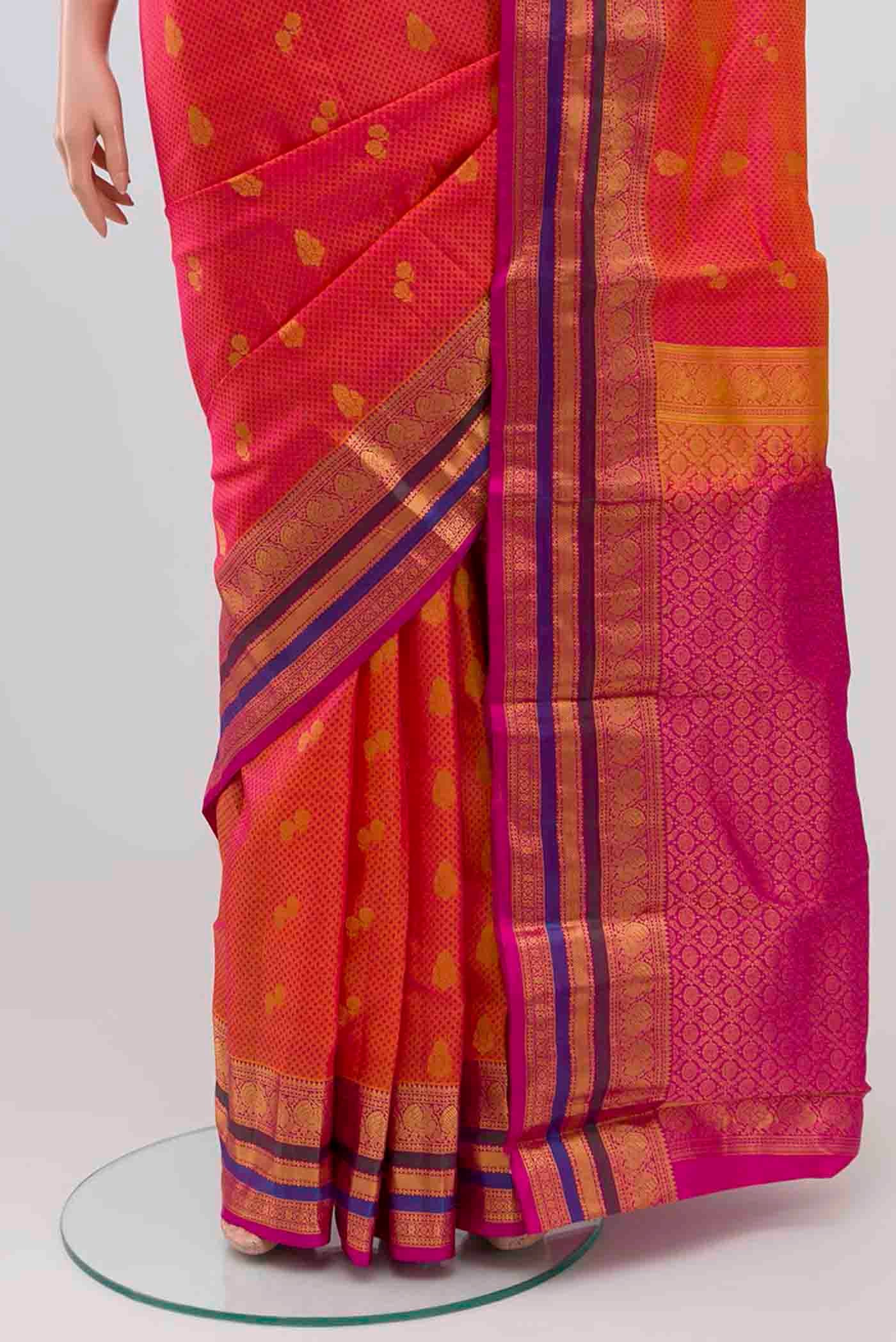 Pleats and pallu of Pink with Yellow Color Kanchipuram Silk Saree with Jacquard With Zari Butta on the body and Zari Border