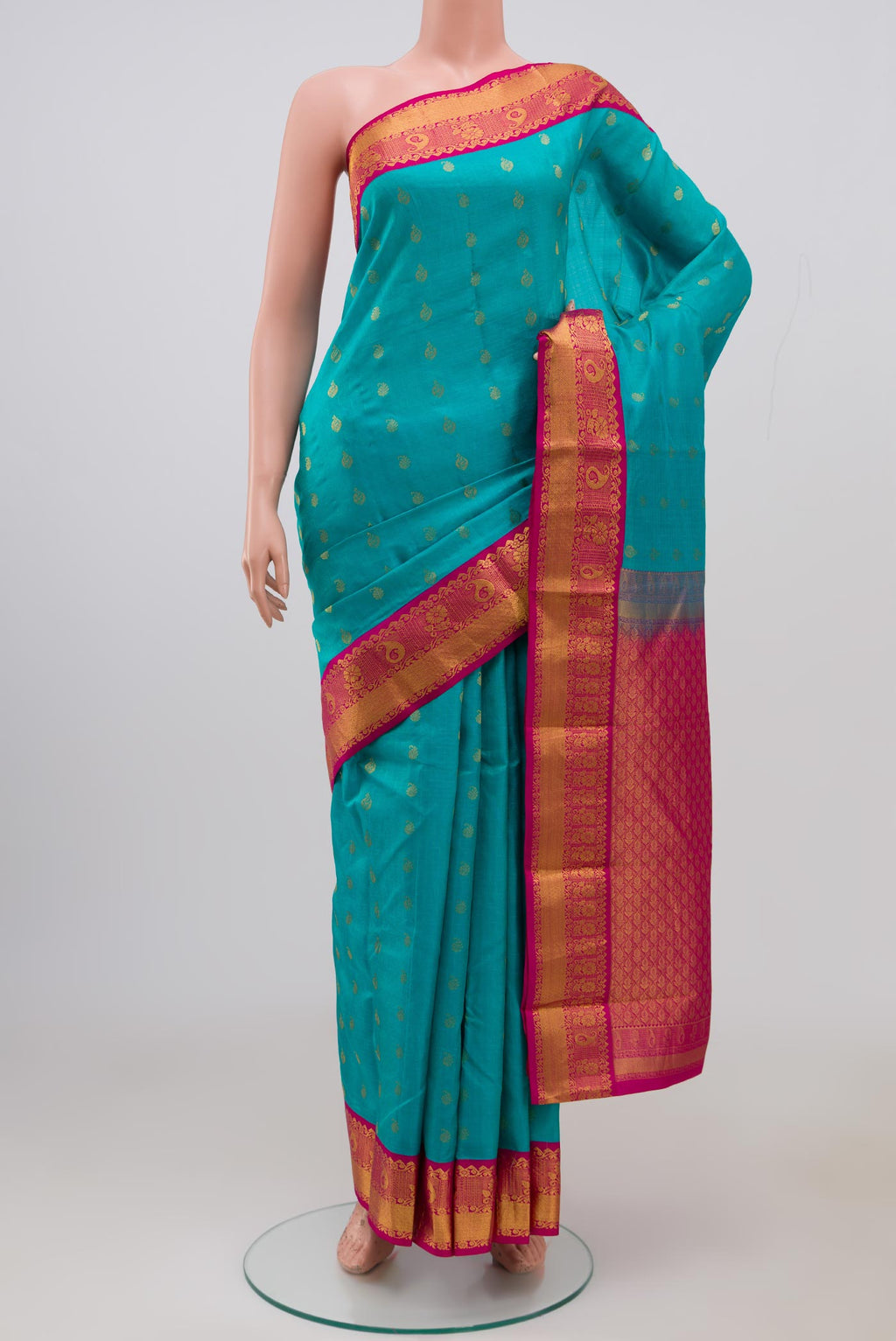 Sky Blue Kanchipuram Saree with Jacquard With Zari Butta on the body and Zari Border.  displayed on a mannequin