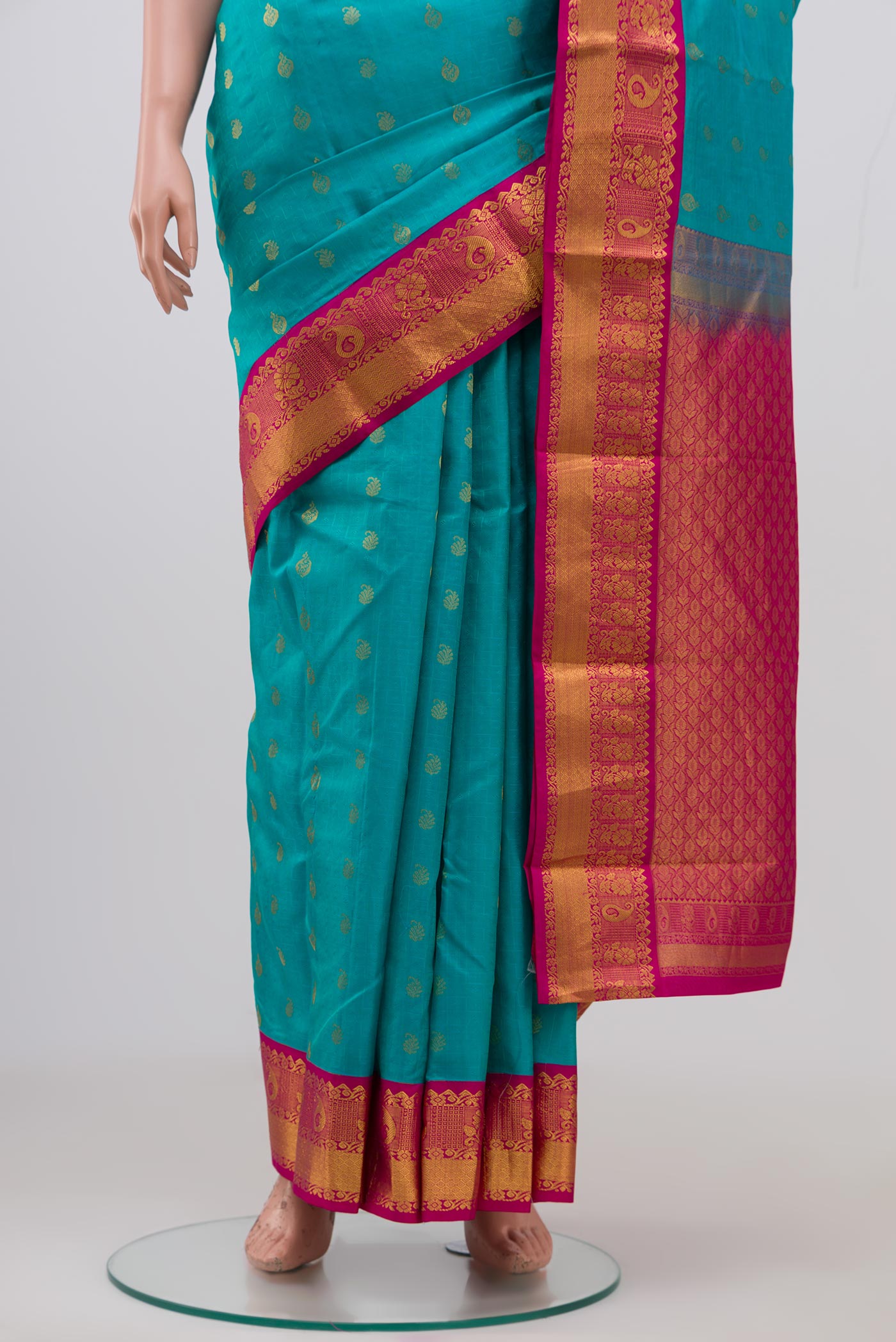 Pleats and pallu of Sky Blue Kanchipuram Saree with Jacquard With Zari Butta on the body and Zari Border. 