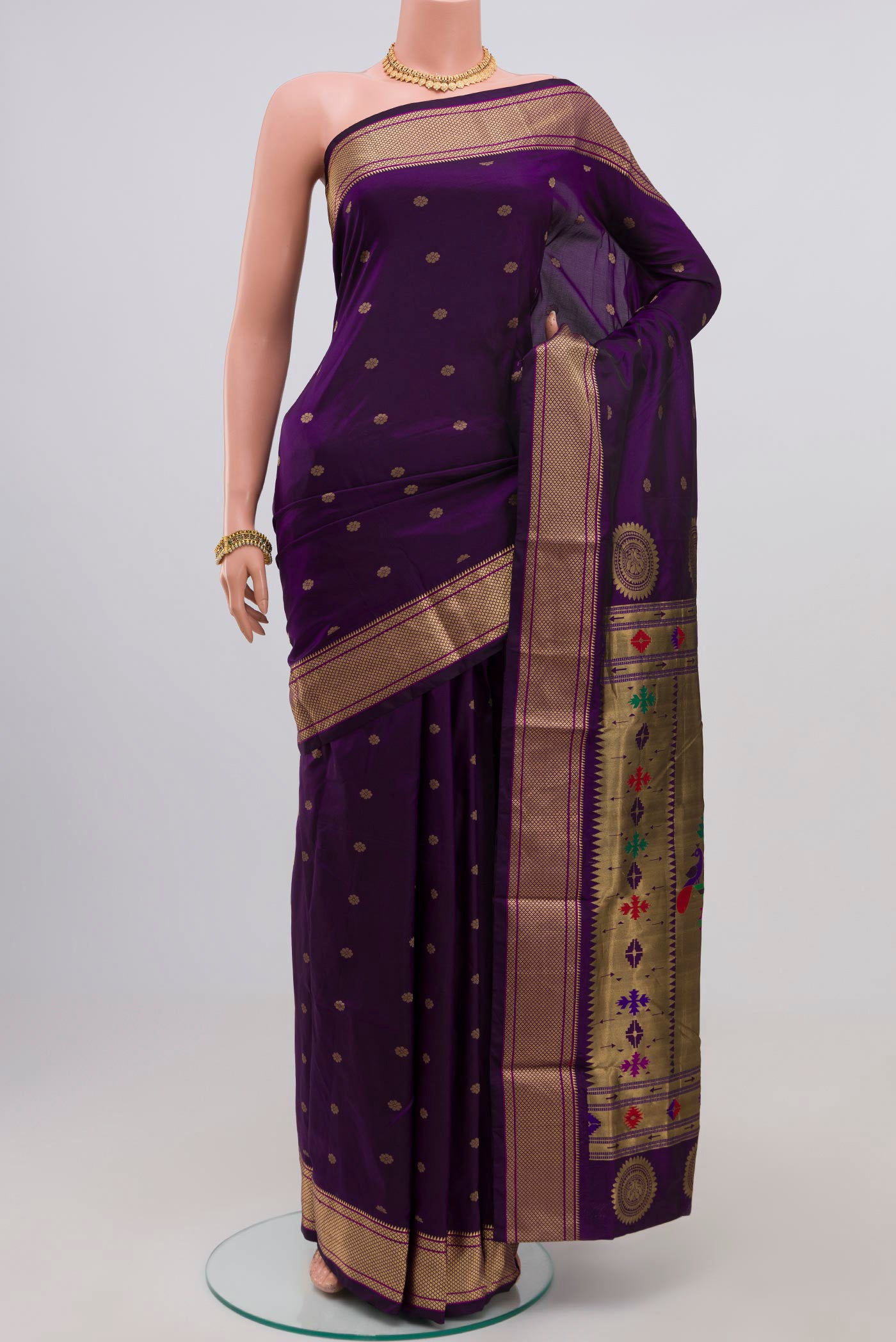 Purple Bangalore Silk Saree with Zari Butta on the body and Zari Border.  displayed on a mannequin
