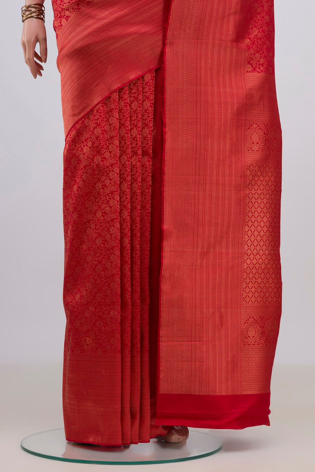 Pleats and pallu of Pure Silk Red Kanchipuram Saree with Zari Brocade on the body and Fancy Border. 