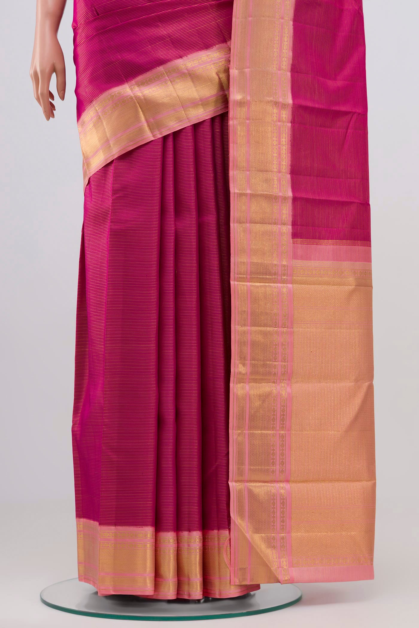 Pleats and pallu of Pure Silk Pure Zari Magenta Kanchipuram Saree with Stripes on the body and Zari Border. 