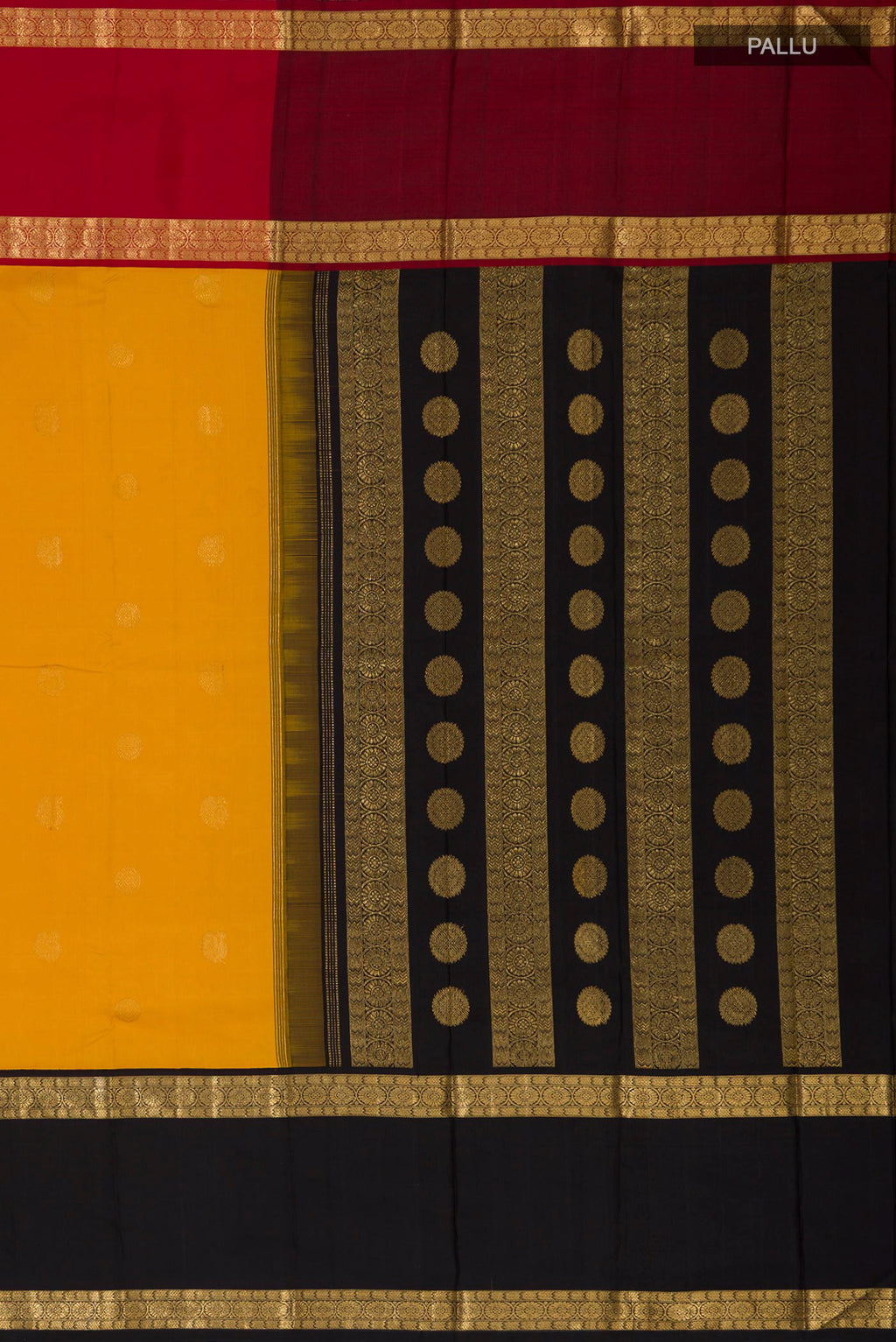Close up image of the pallu of Pure Silk Pure Zari Yellow Kanjivaram Saree with Zari Butta on the body and Ganga Jamuna Border. 
