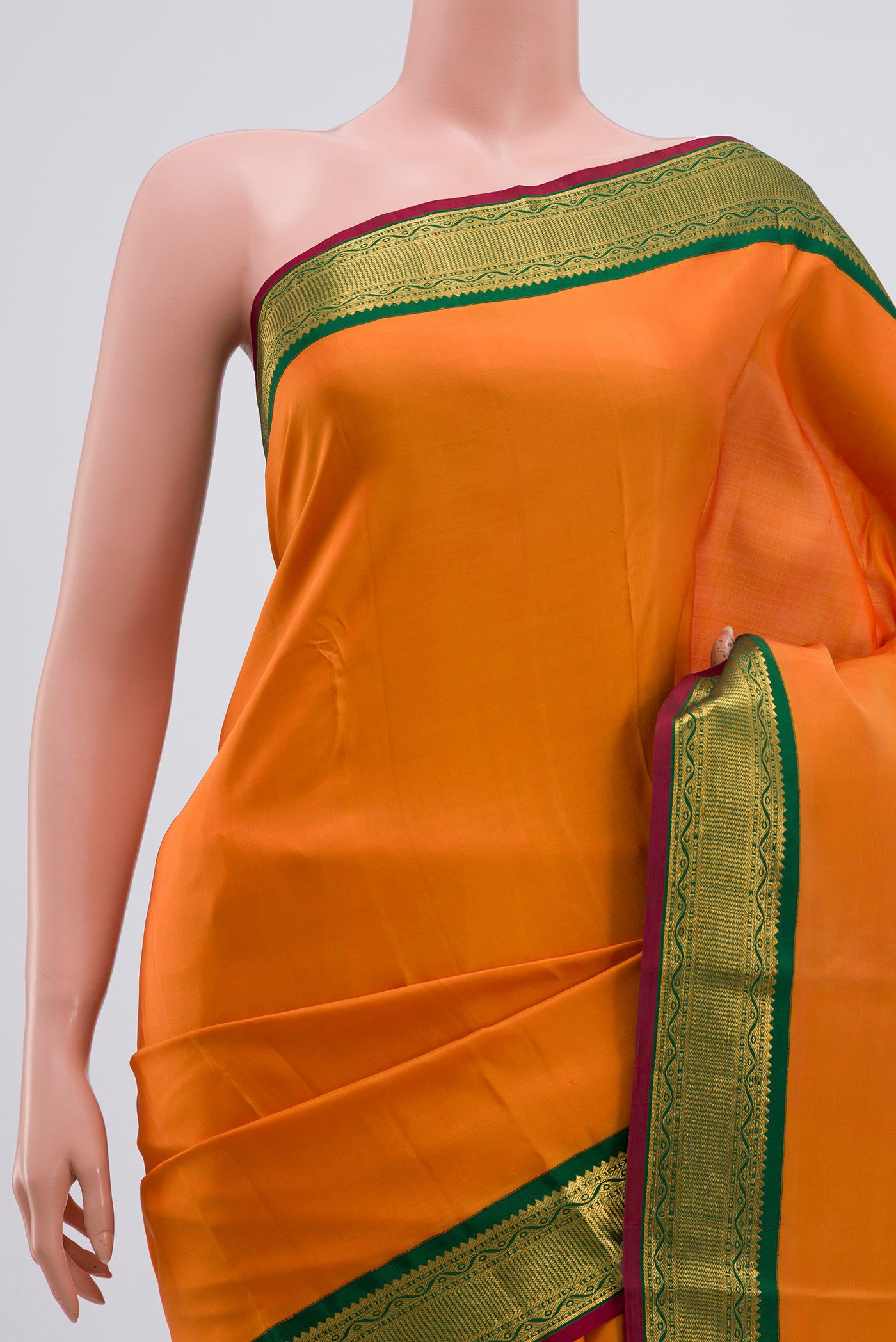 Border image of Pure Silk Pure Zari Orange Kanchipuram Saree with Plain Body and Zari Border. 