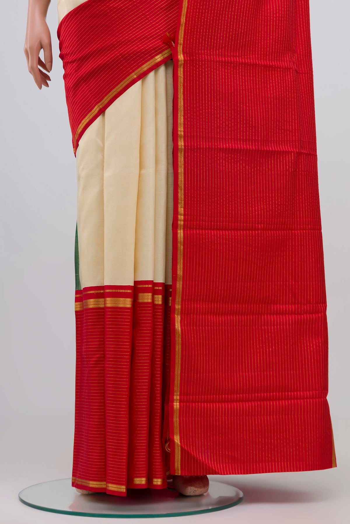 Pleats and pallu of Multi Color Kanjivaram Silk Saree with Zari Butta on the body and Ganga Jamuna Border. 