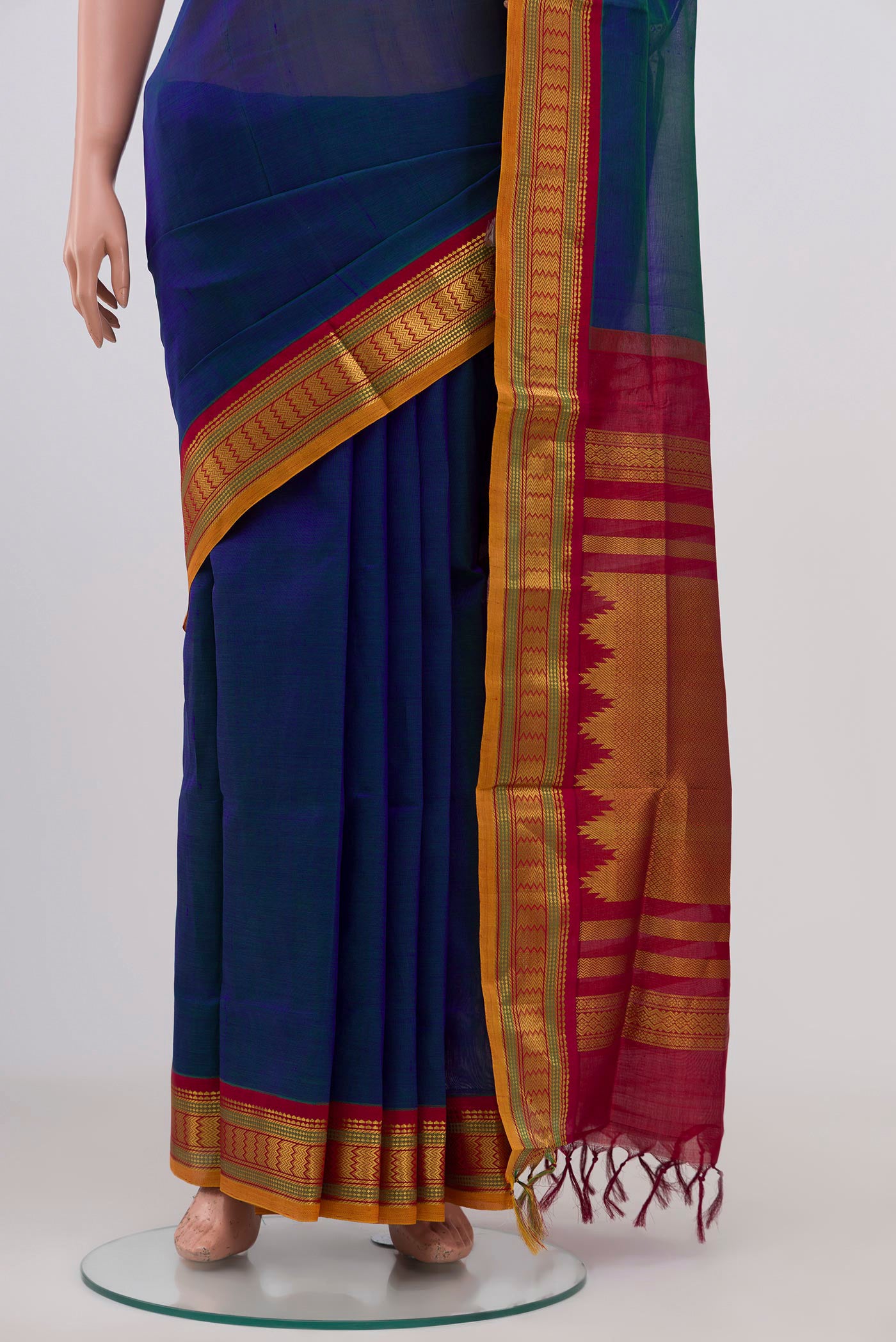 Pleats and pallu of Peacock Blue Silk Cotton Saree with Plain Body and Zari Border. 