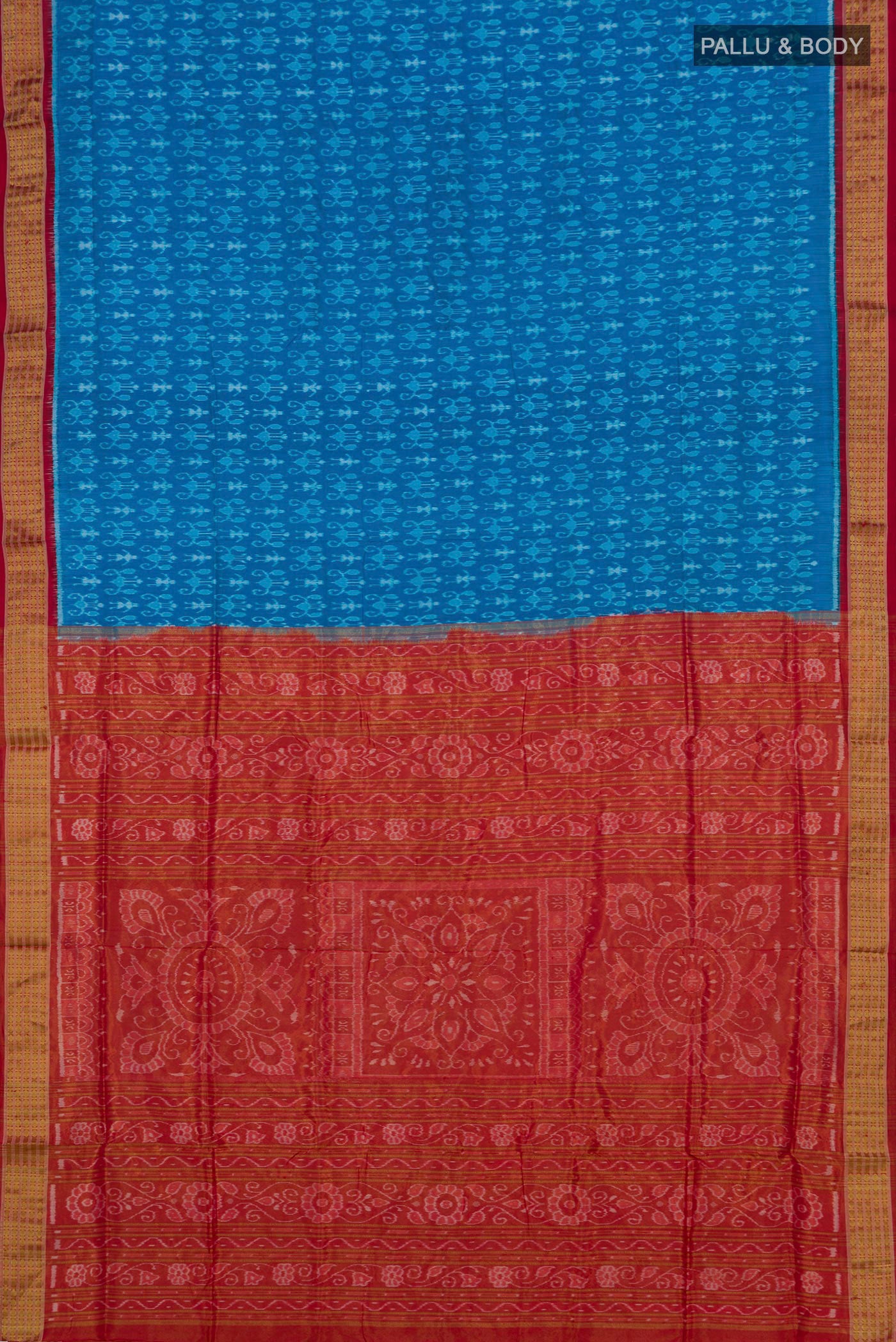 Flat view of Blue Orissa Silk Saree with Ikat Print on the body and Zari Border. 