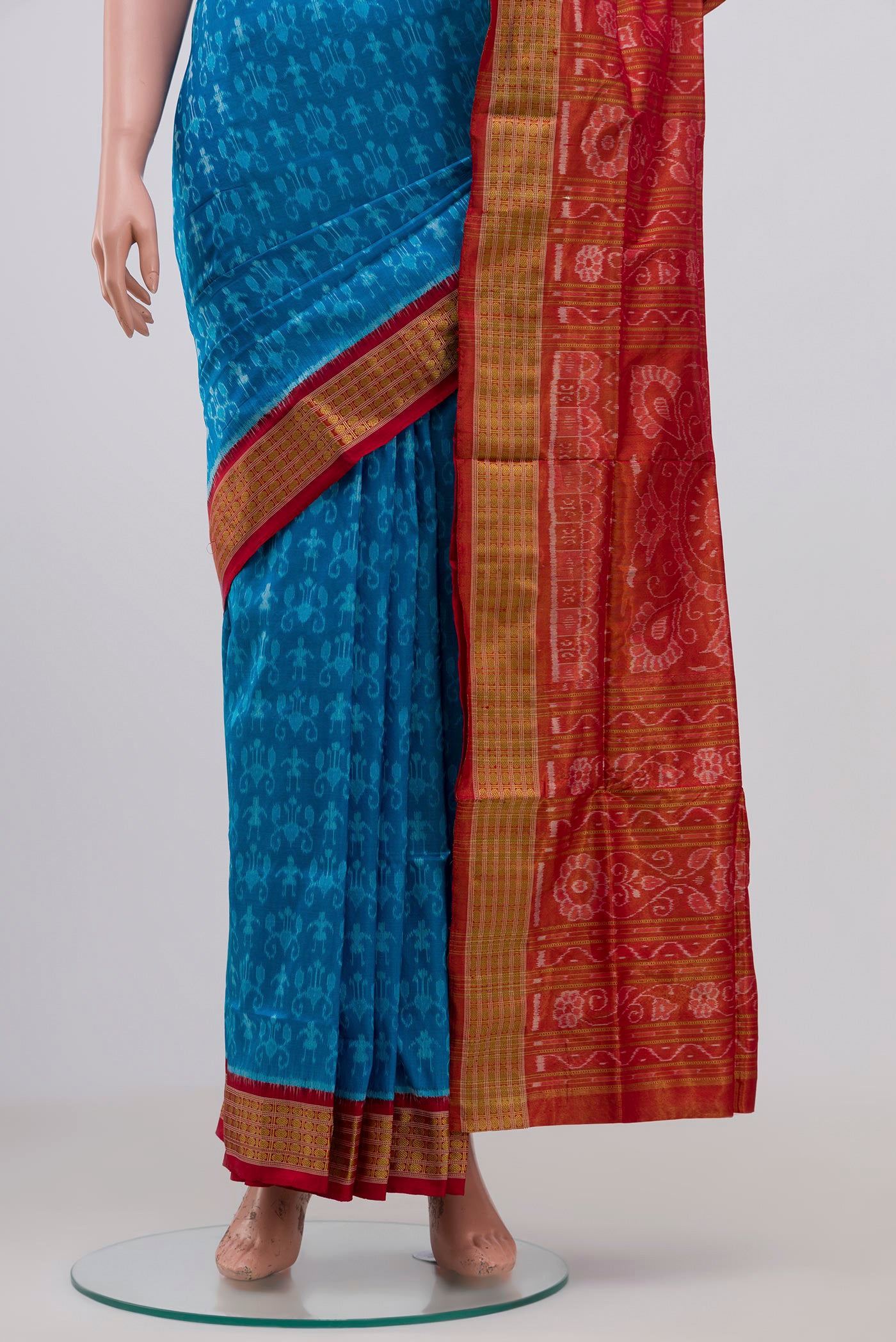 Pleats and pallu of Blue Orissa Silk Saree with Ikat Print on the body and Zari Border. 
