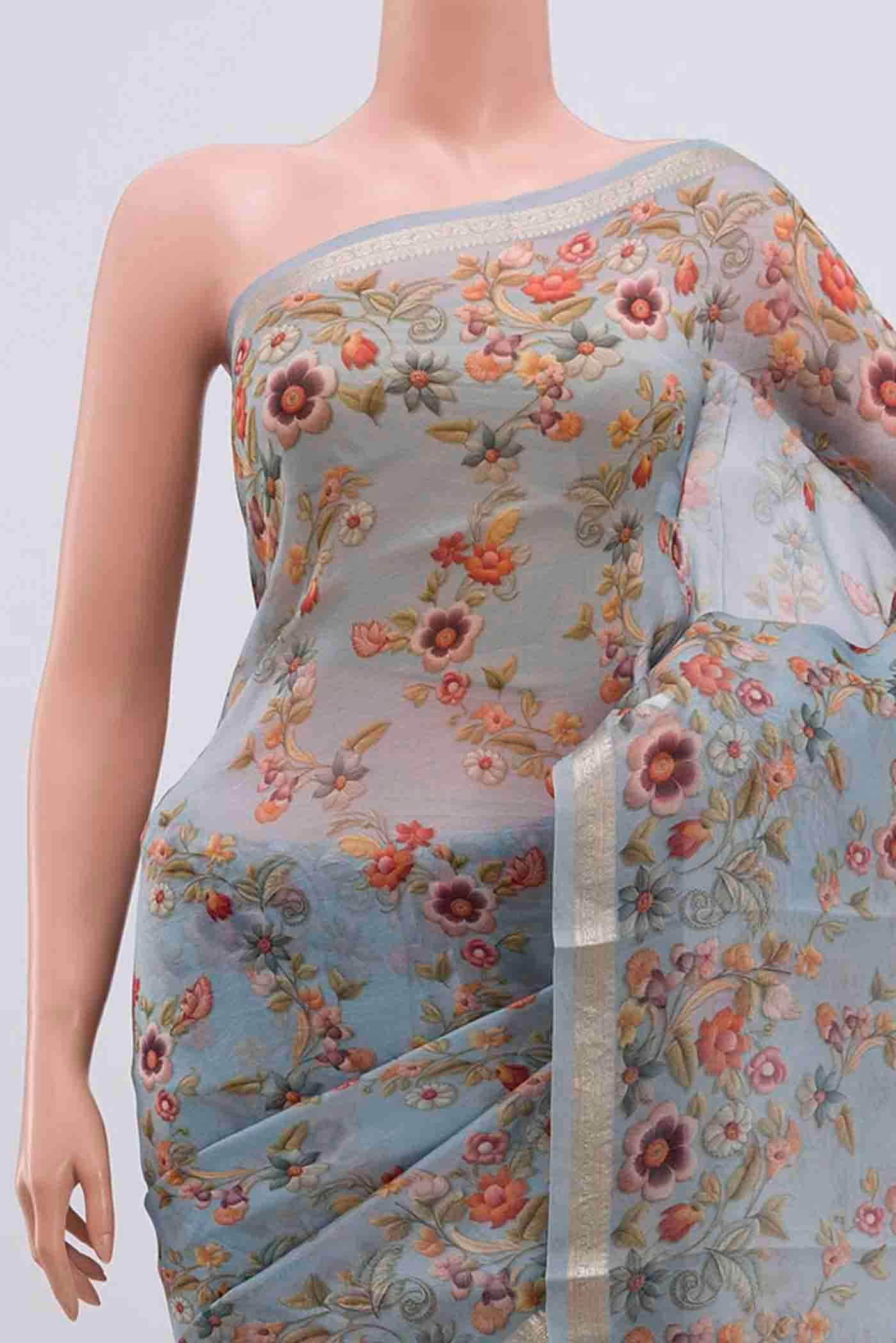 Border image of Sky Blue Organza Silk Saree with Floral Print on the body and Zari Border