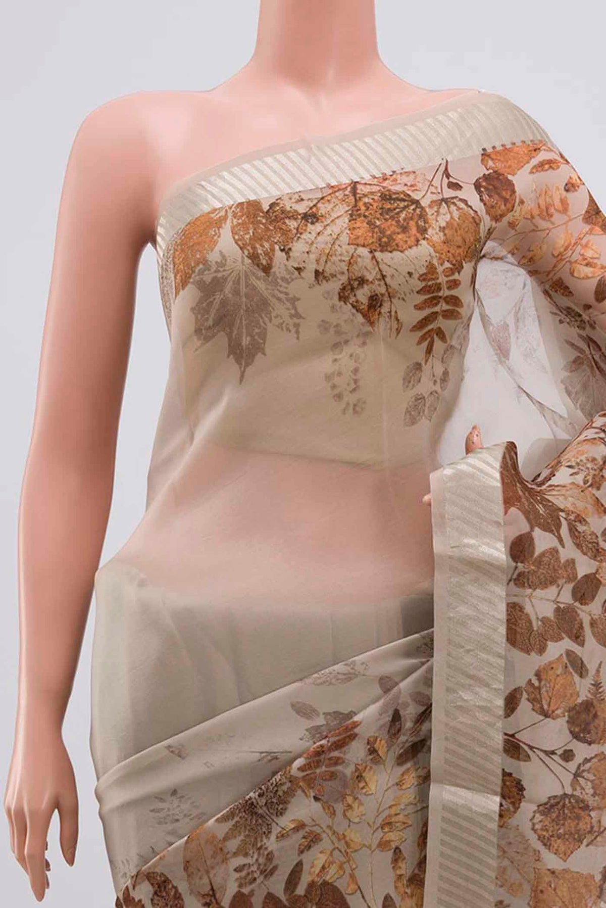 Border image of Grey Organza Silk Saree with Floral Print on the body and Zari Border