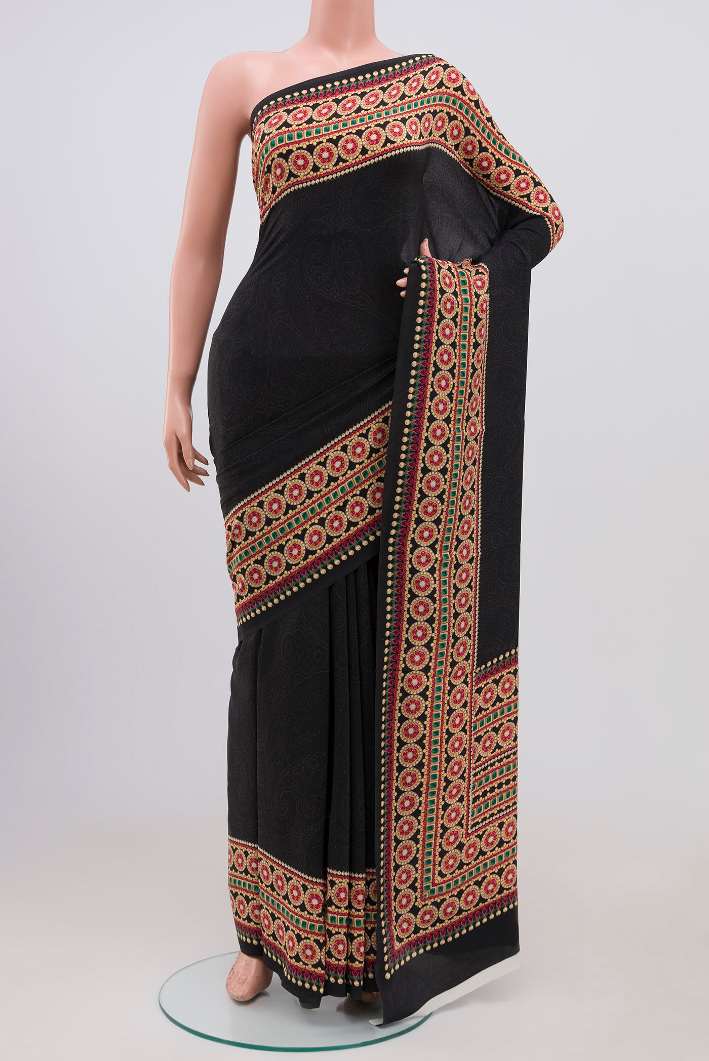 Black Mysore Crepe Saree with Floral Print on the body and Without Border.  displayed on a mannequin