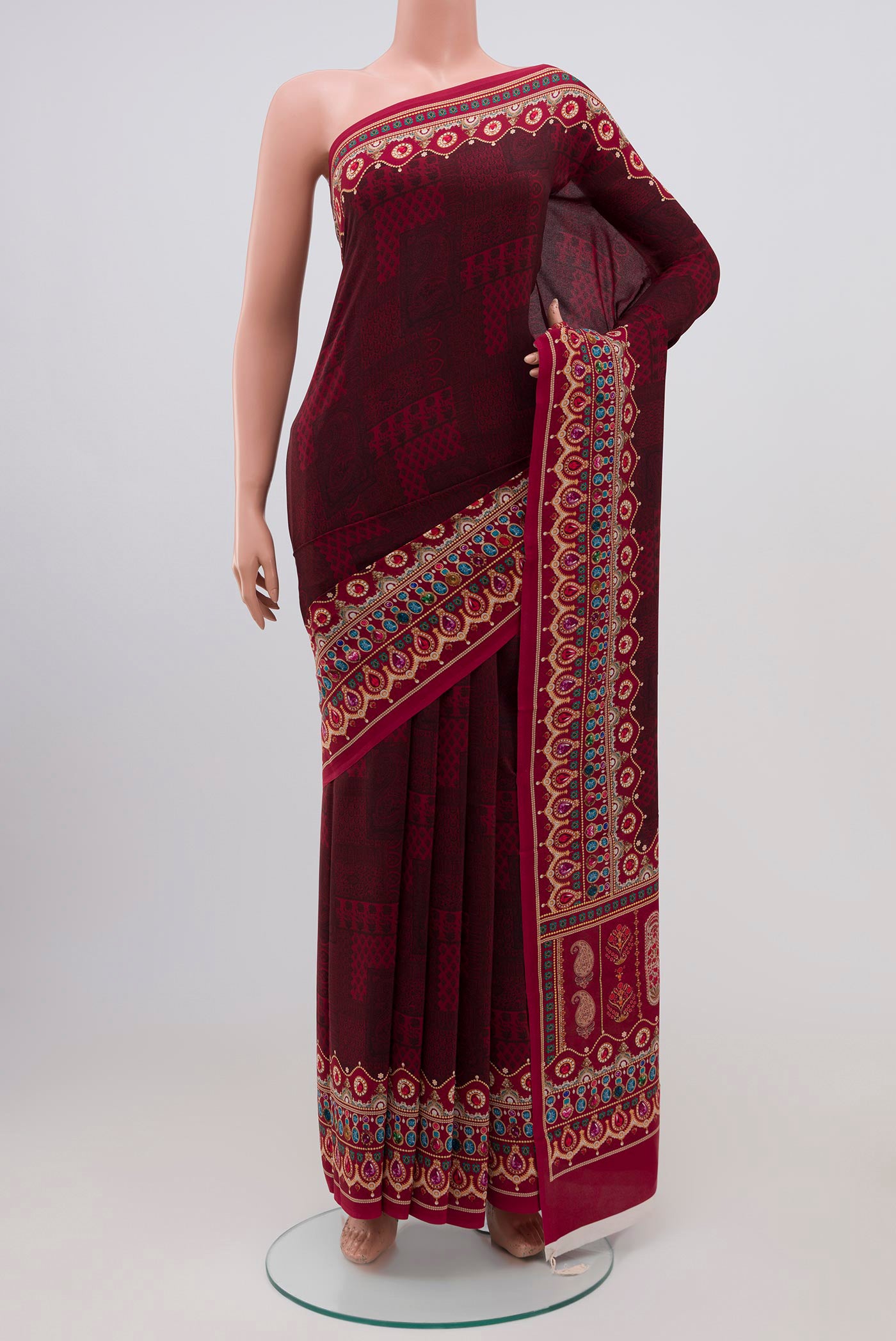 Deep Red Mysore Crepe Saree with Floral Print on the body and Printed Border.  displayed on a mannequin