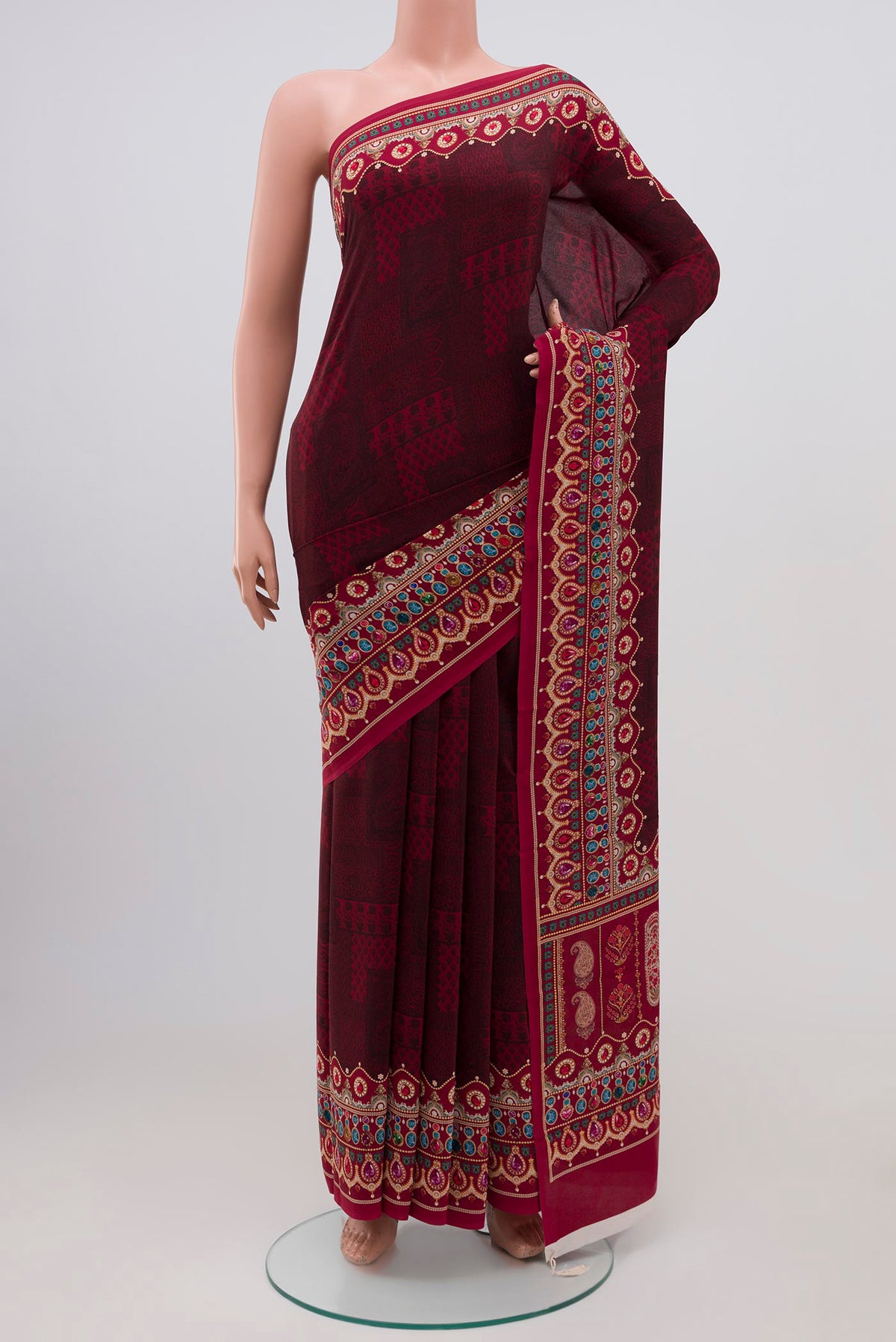 Deep Red Mysore Crepe Saree with Floral Print on the body and Printed Border.  displayed on a mannequin