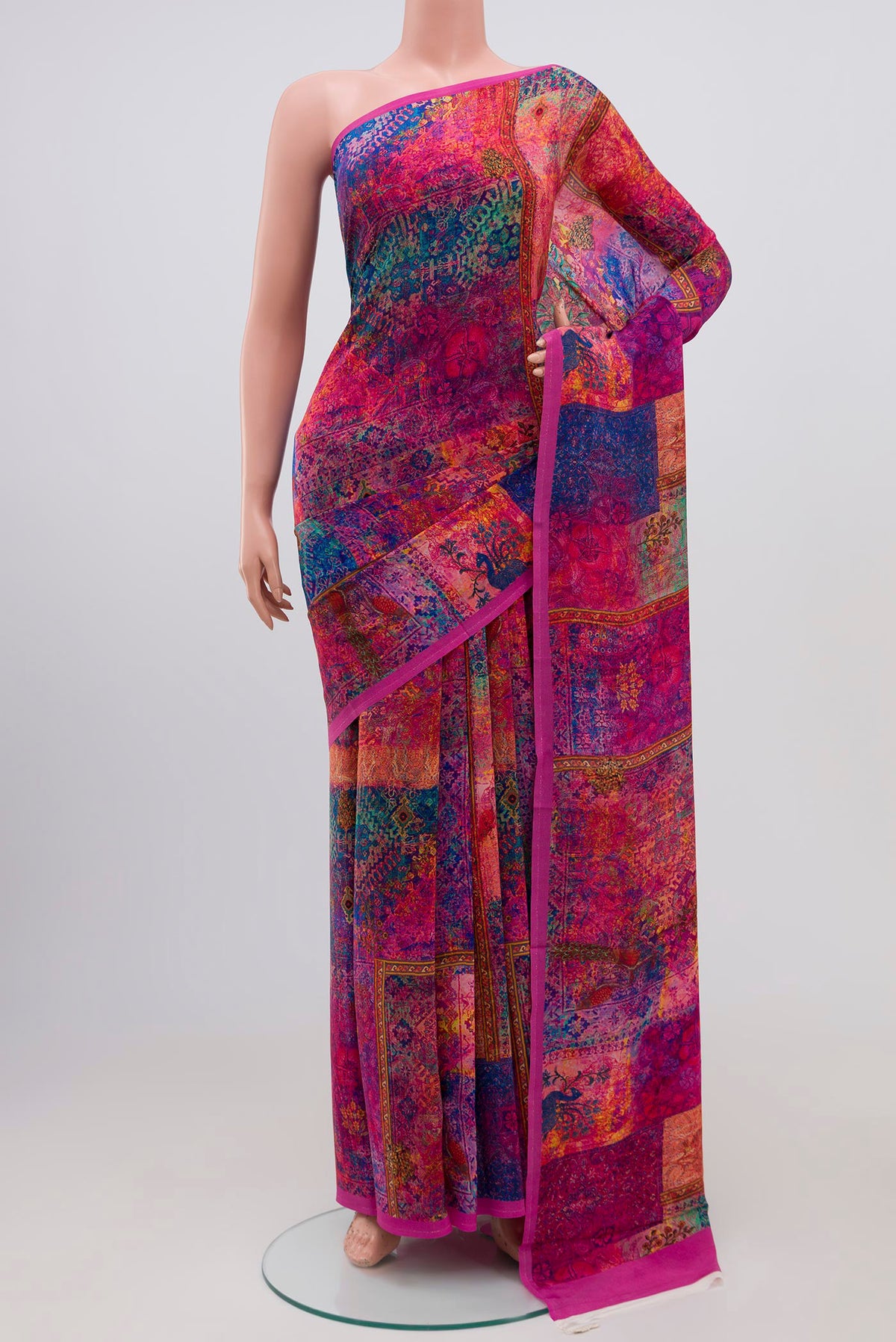 Dark Pink Mysore Crepe Saree with Floral Print on the body and Printed Border.  displayed on a mannequin
