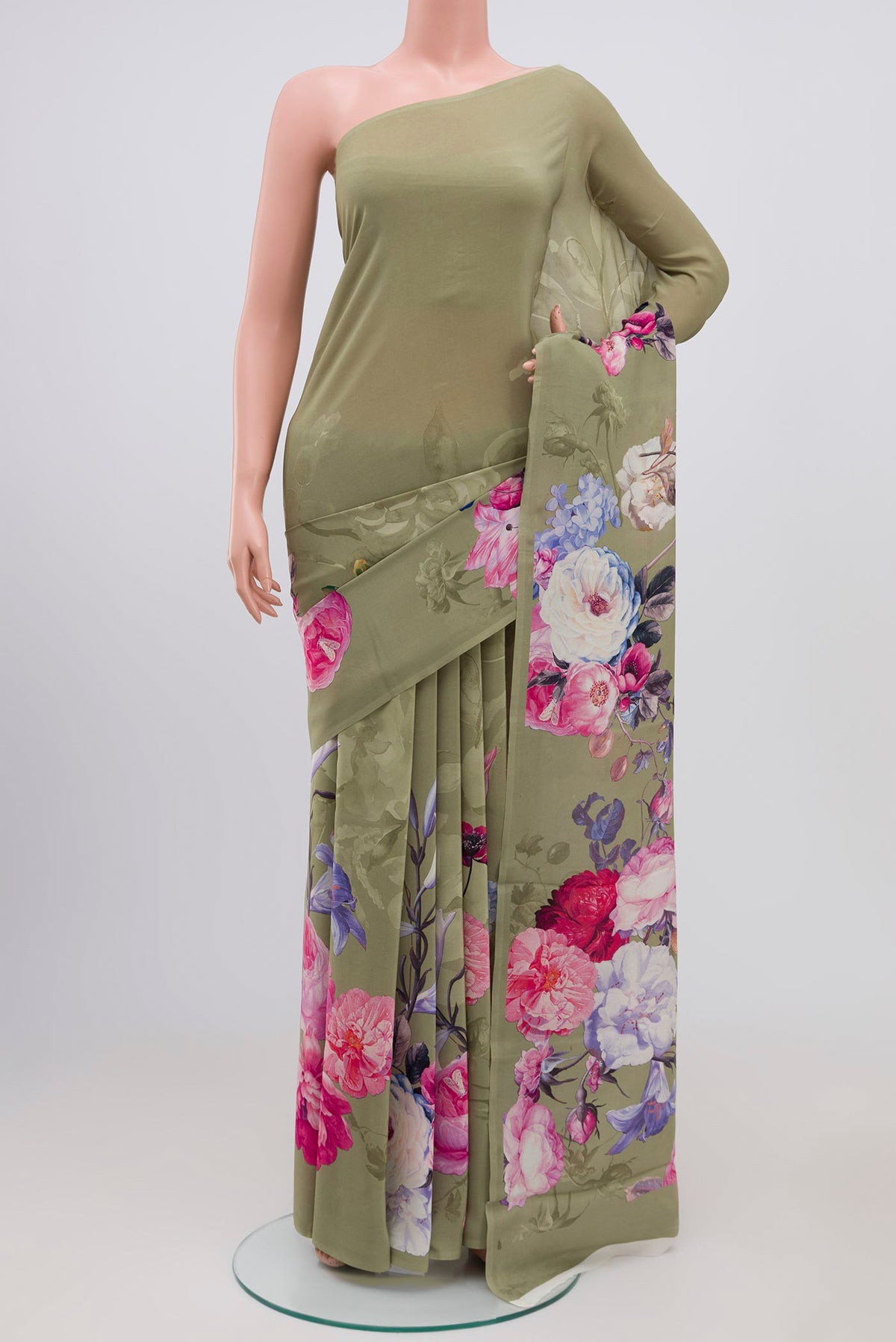 Mehandi Green Crepe Saree with Floral Print on the body and Without Border.  displayed on a mannequin