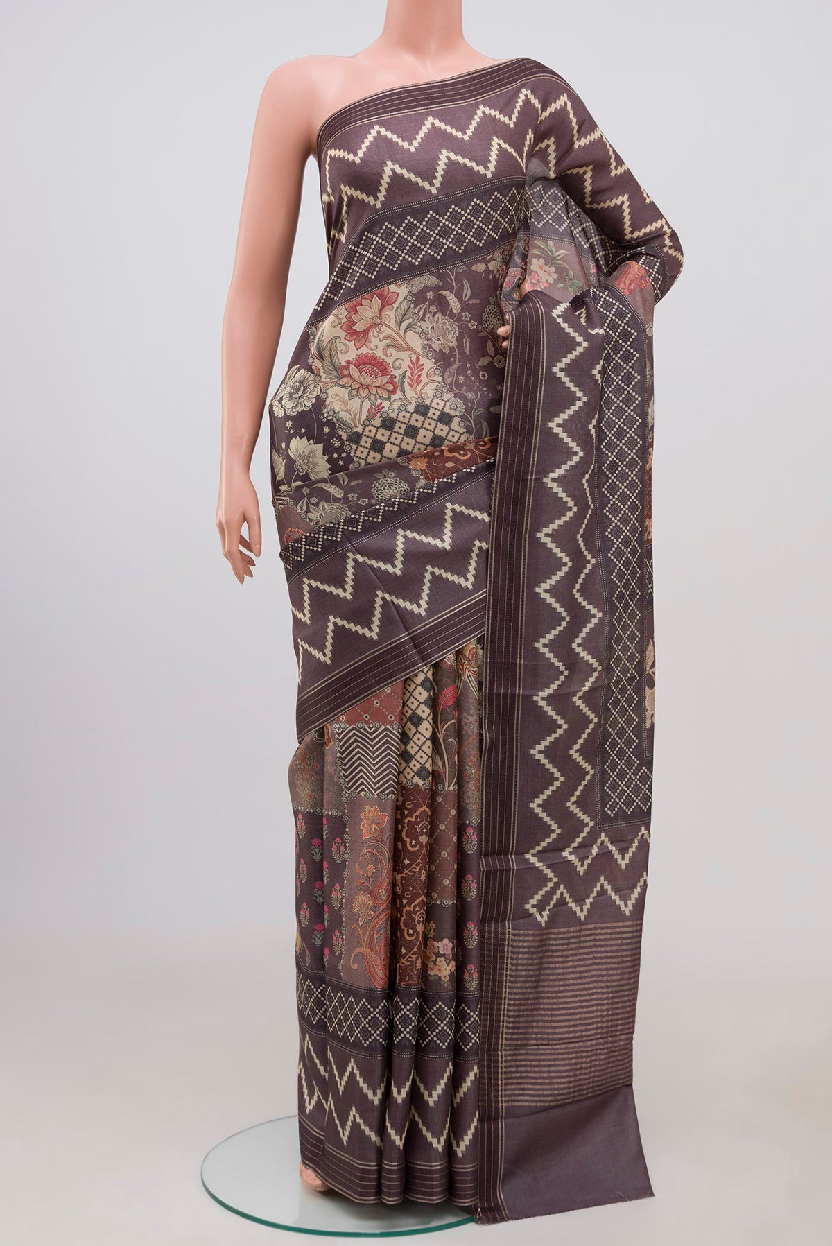 Multi Color Tussar Silk Saree with Fancy on the body and Fancy Border.  displayed on a mannequin
