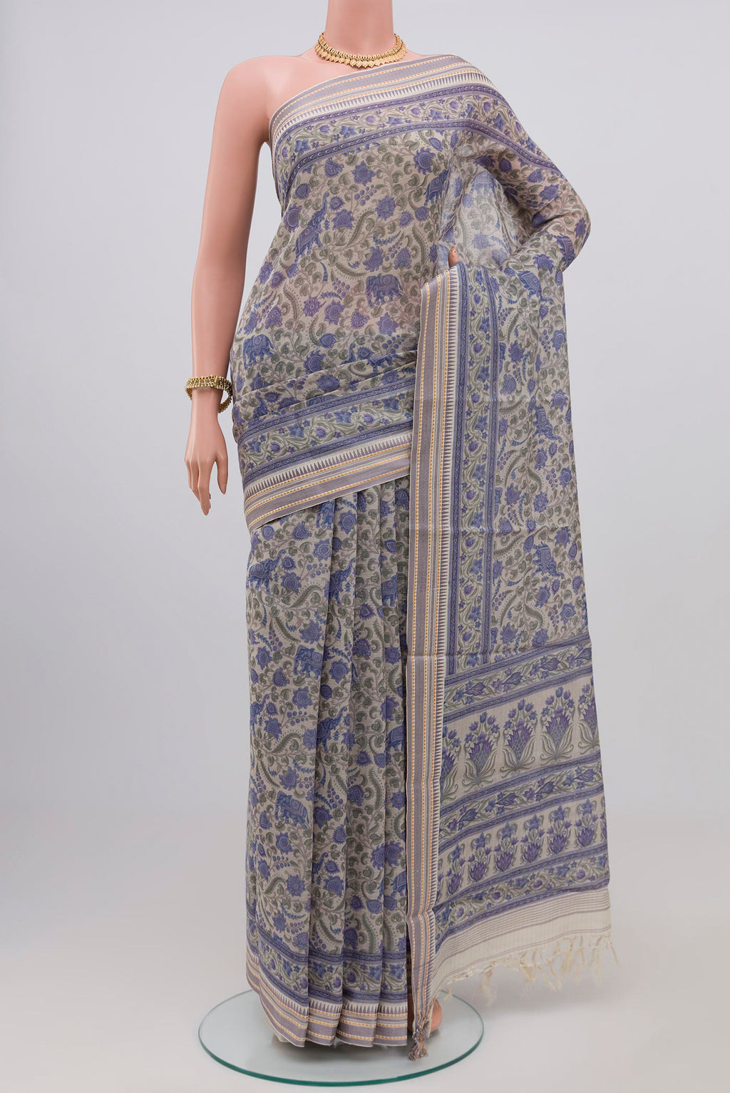 Grey Printed Cotton Saree with Printed design on the body and Thread Border.  displayed on a mannequin
