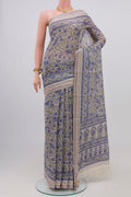 Grey Printed Cotton Saree with Printed design on the body and Thread Border.  displayed on a mannequin