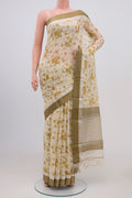 Off White Tussar Saree with Floral Print on the body and Zari Border.  displayed on a mannequin