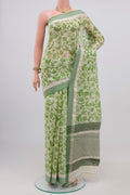 Off White Printed Cotton Saree with Printed design on the body and Thread Border.  displayed on a mannequin