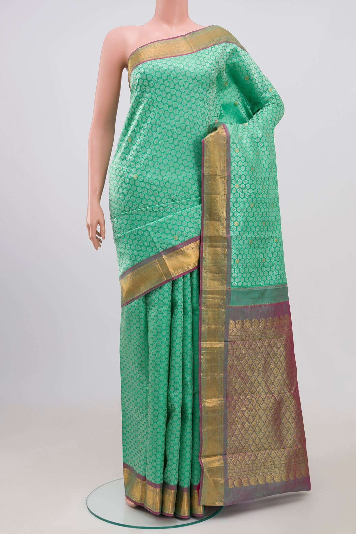 Pure Silk Pure Zari Sea Green Kanjivaram Saree with Jacquard With Zari Butta on the body and Zari Border.  displayed on a mannequin