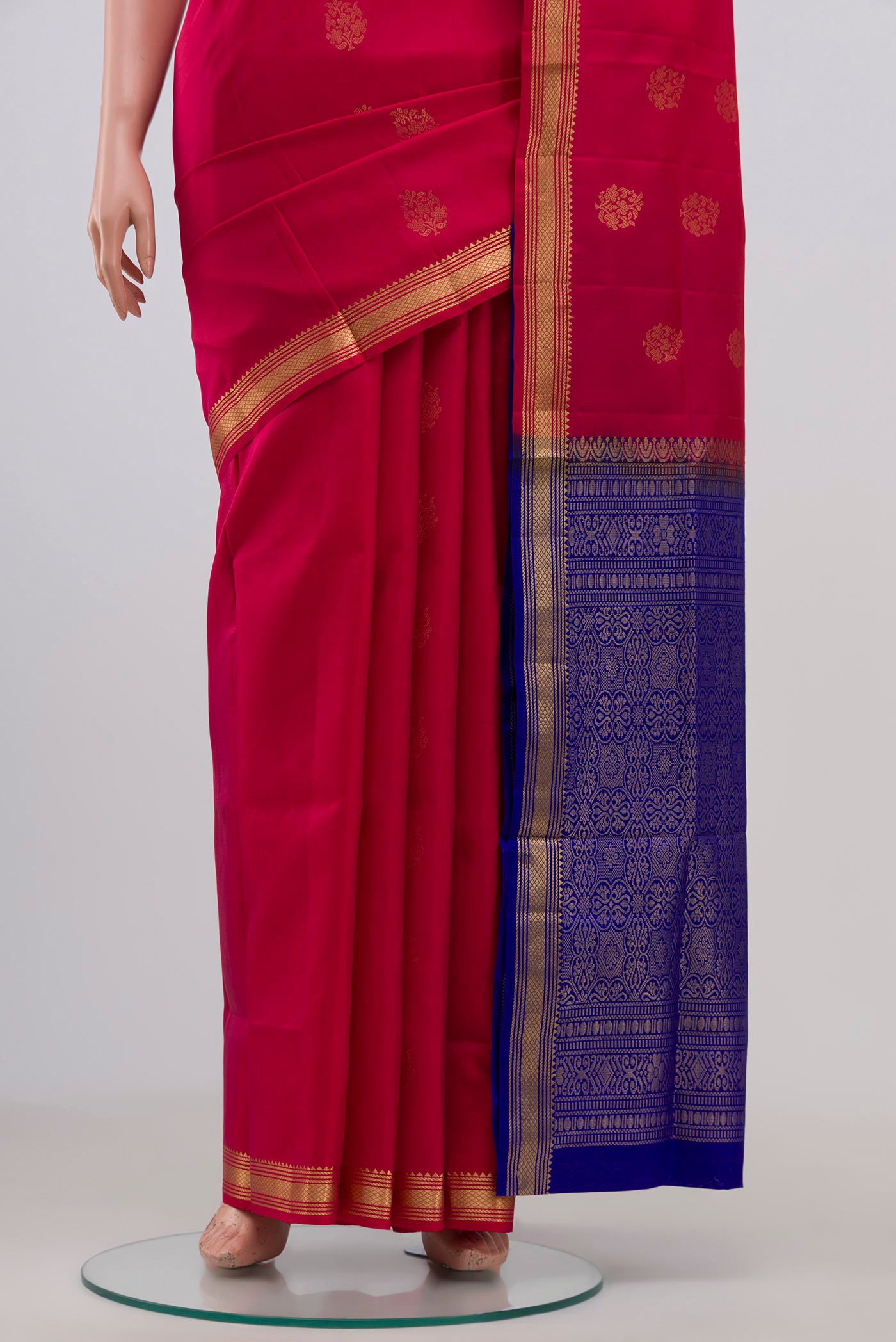 Pleats and pallu of Pink Soft Silk Saree with Zari Butta on the body and Zari Border. 