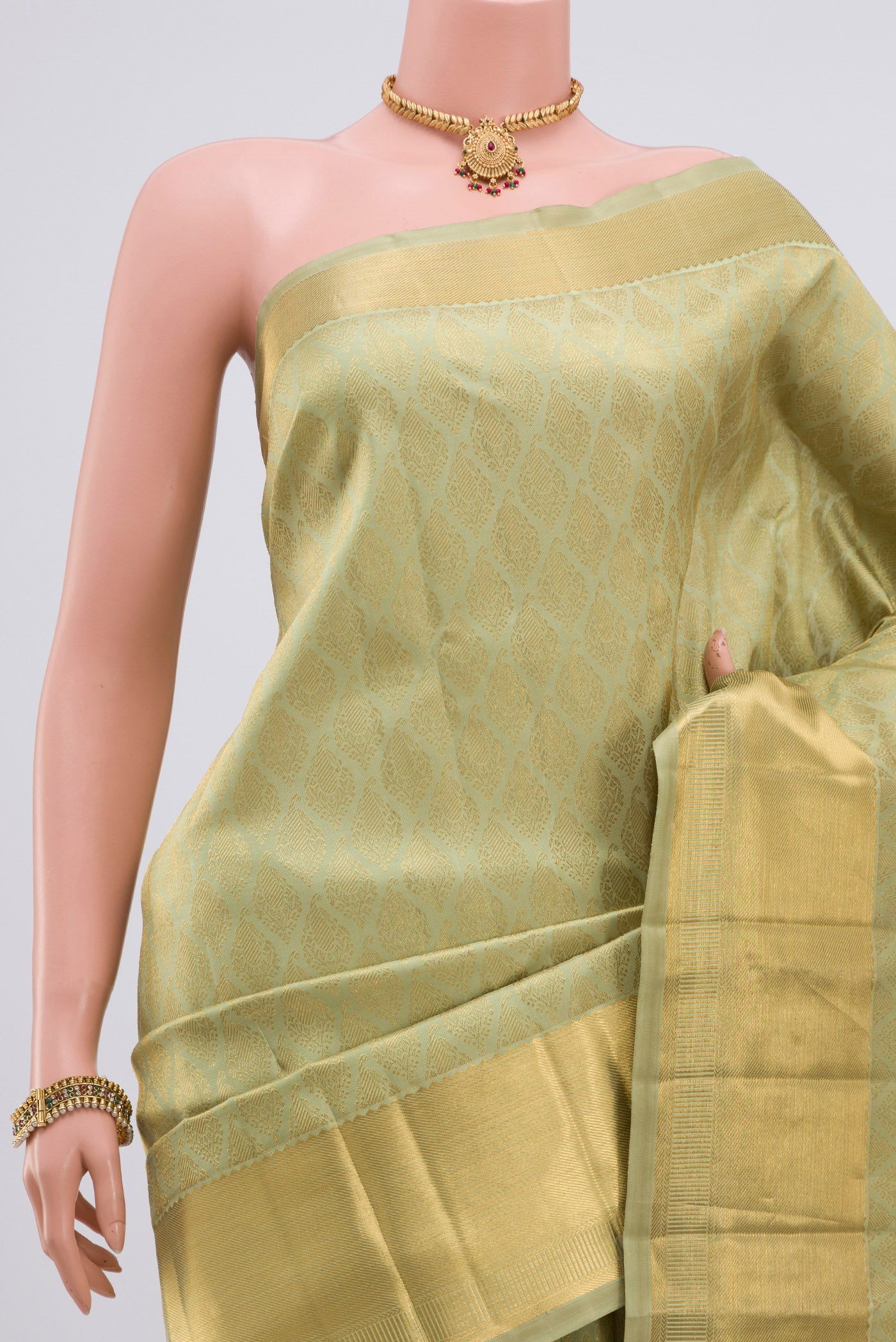 Border image of Pure Silk Pure Zari Pista Green Kanjivaram Saree with Zari Brocade on the body and Zari Border. 