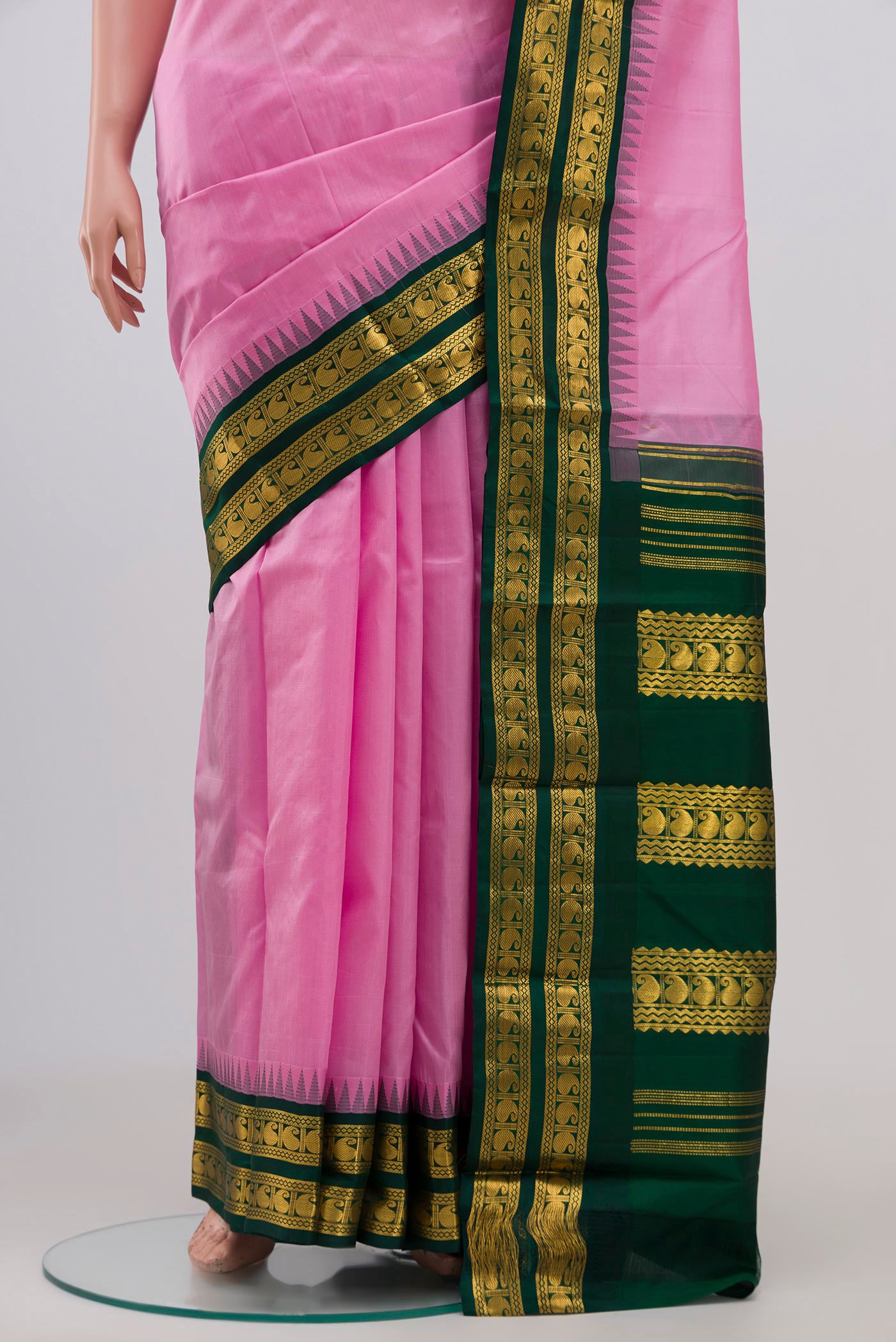 Pleats and pallu of Pink Kanjivaram Silk Saree with Plain Body and Zari Border. 
