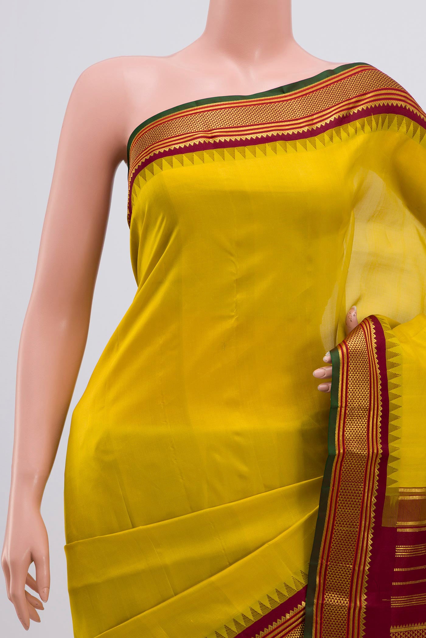 Border image of Lemon Yellow Kanjivaram Silk Saree with Plain Body and Zari Border. 