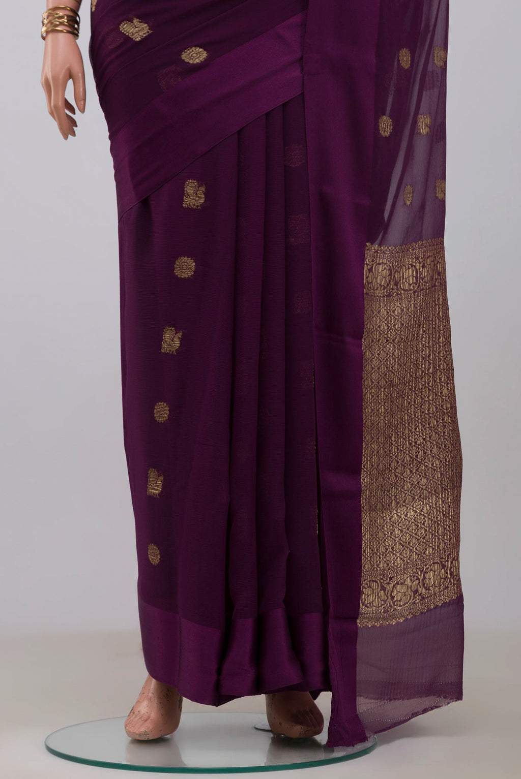 Pleats and pallu of Purple Mysore Chiffon Saree with Zari Butta on the body and Plain Border. 