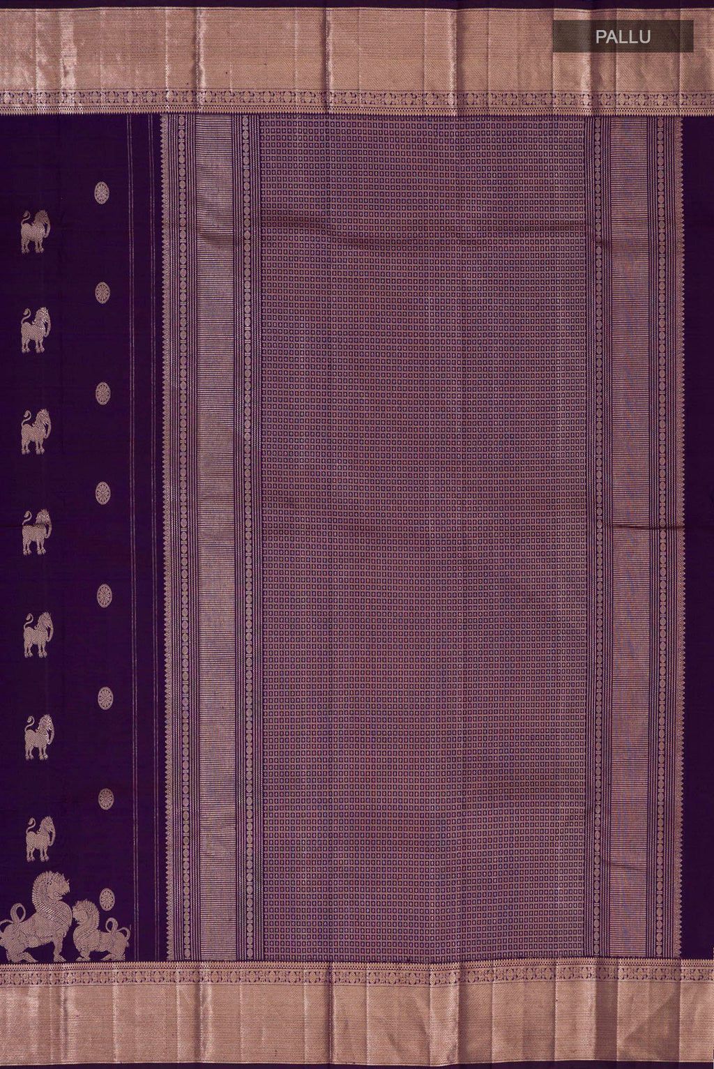Close up image of the pallu of Purple Kanchipuram Silk Saree with Zari Butta on the body and Zari Border. 