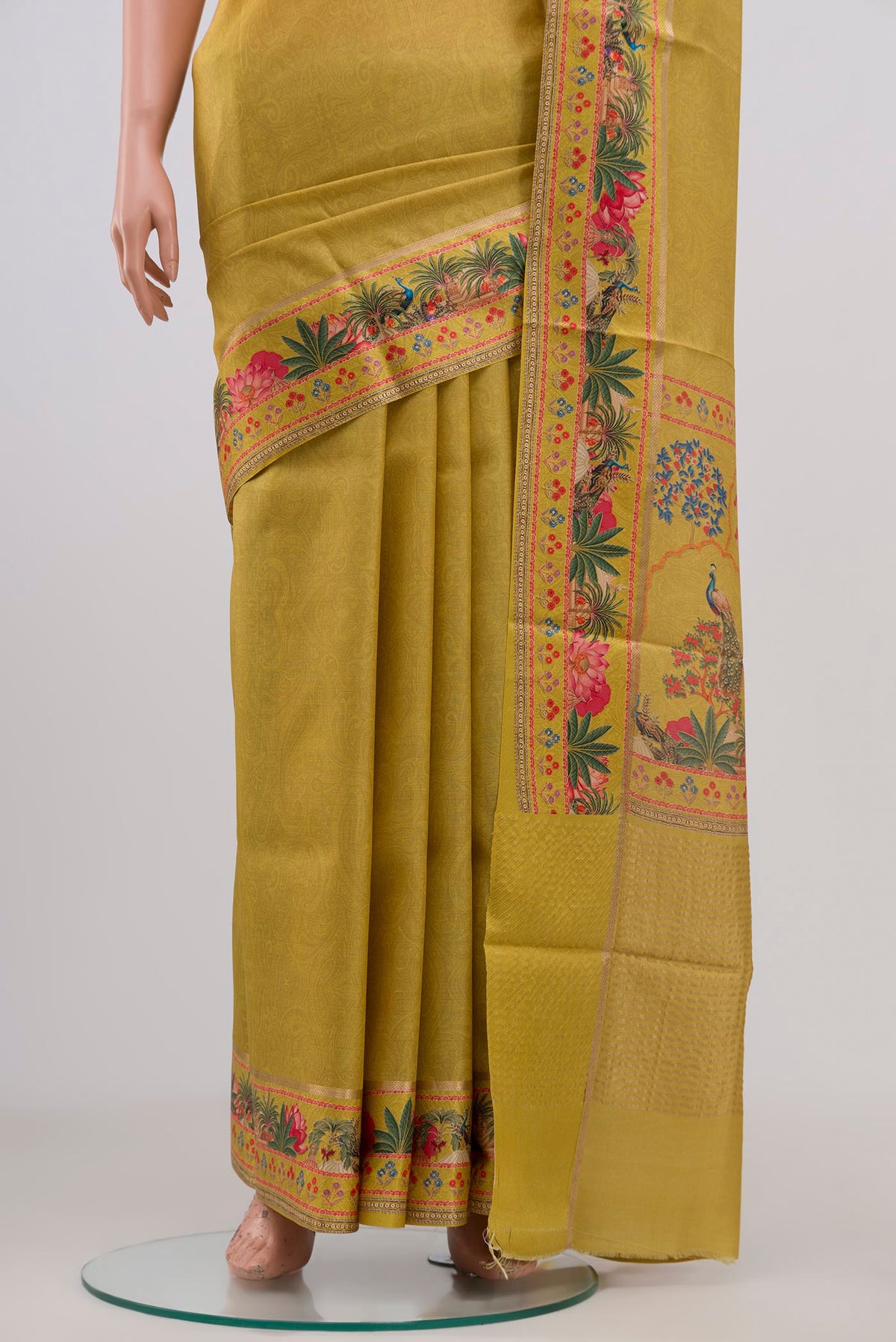 Pleats and pallu of Yellow Tussar Silk Saree with Fancy on the body and Fancy Border. 
