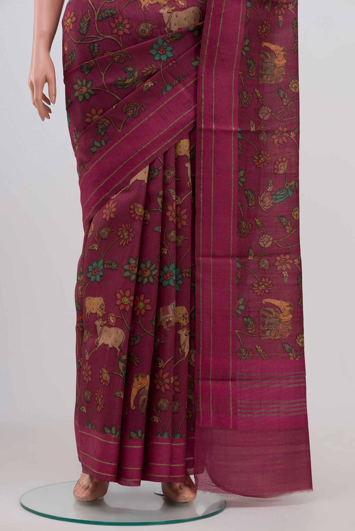 Pleats and pallu of Purple Tussar Silk Saree with Floral Print on the body and Thin Zari Line. 