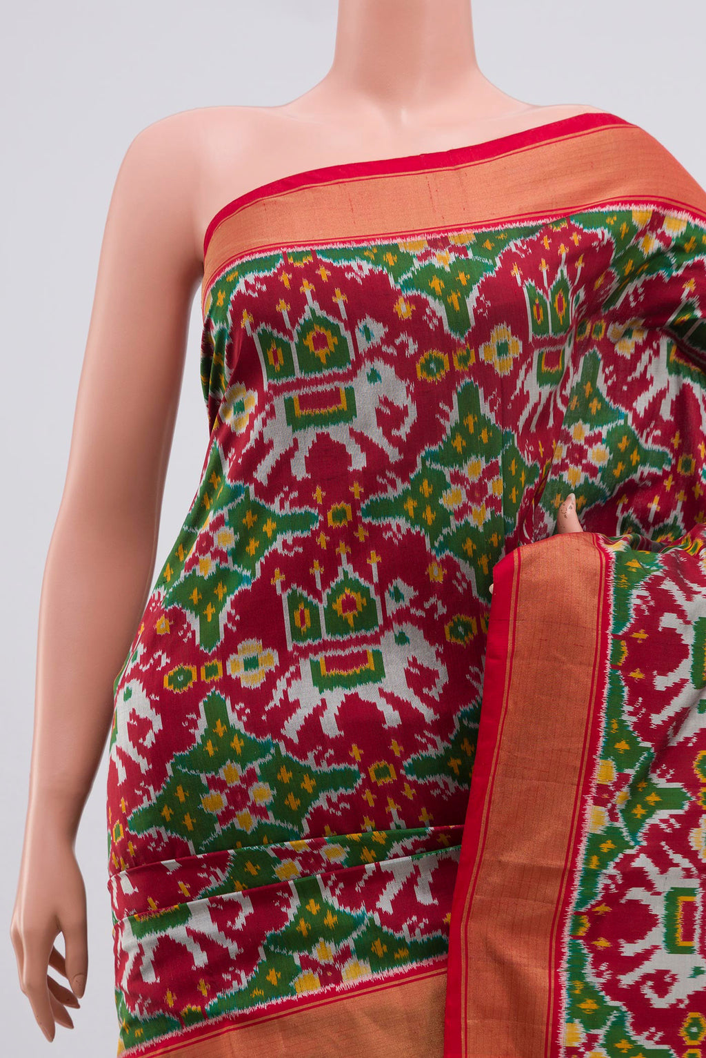 Border image of Maroon Pochampally Silk Saree with Ikat Print on the body and Zari Border. 