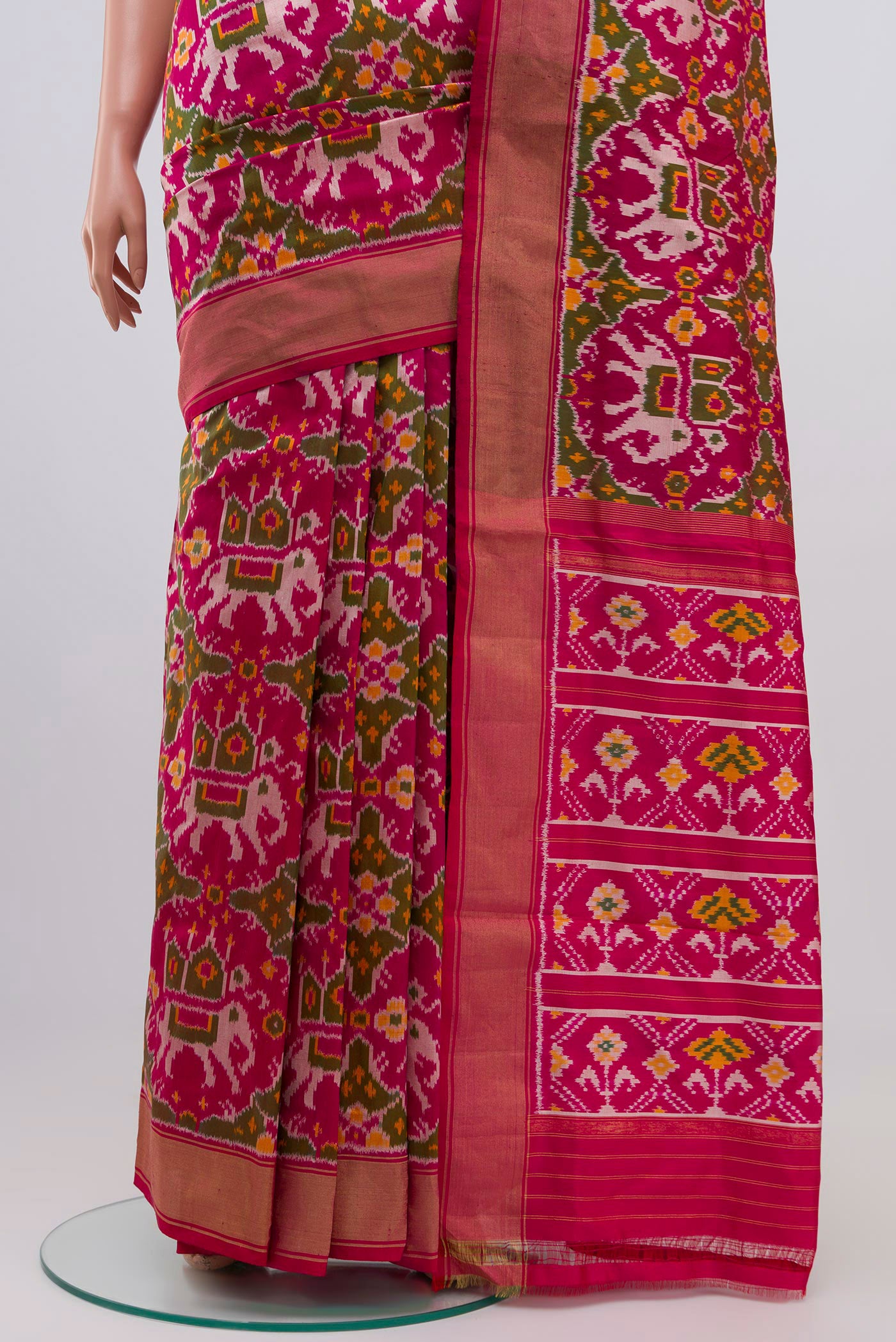 Pleats and pallu of Pink Pochampally Silk Saree with Ikat Print on the body and Zari Border. 