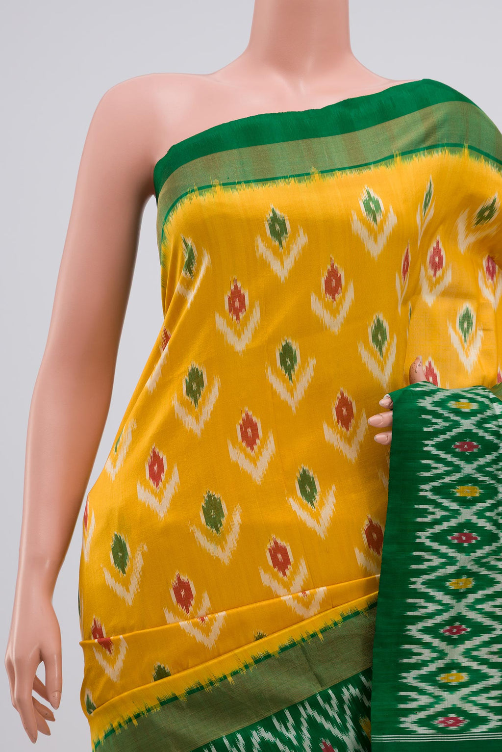 Border image of Yellow Pochampally Silk Saree with Ikat Print on the body and Ikat Border. 