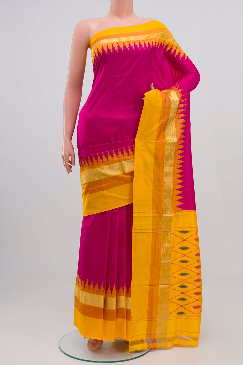 Pink Pochampally Silk Saree with Plain Body and Zari Border.  displayed on a mannequin