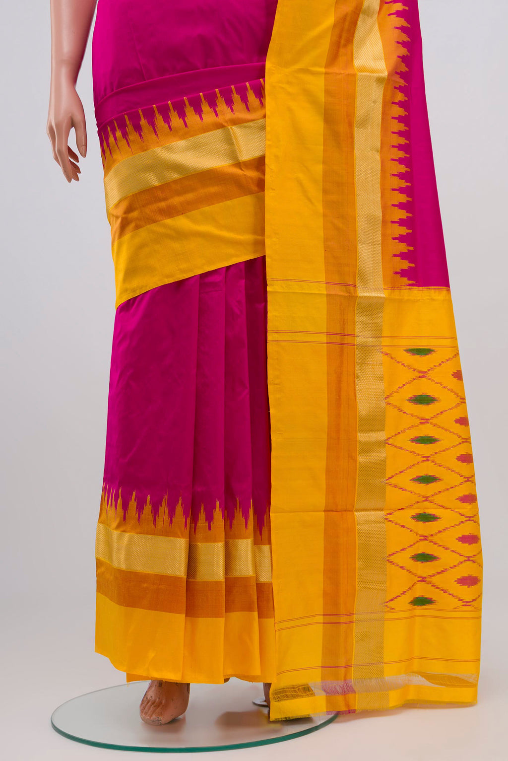 Pleats and pallu of Pink Pochampally Silk Saree with Plain Body and Zari Border. 