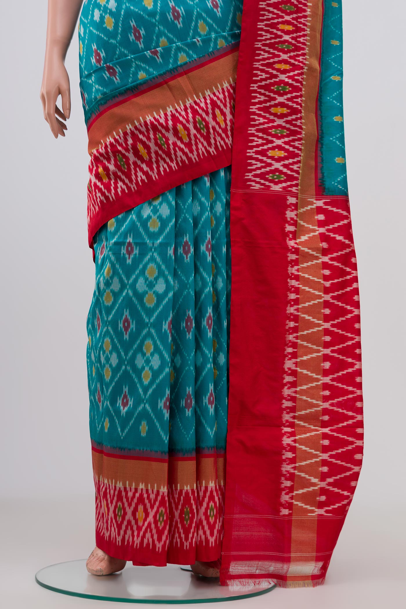 Pleats and pallu of Sky Blue Pochampally Silk Saree with Ikat Print on the body and Ikat Border. 