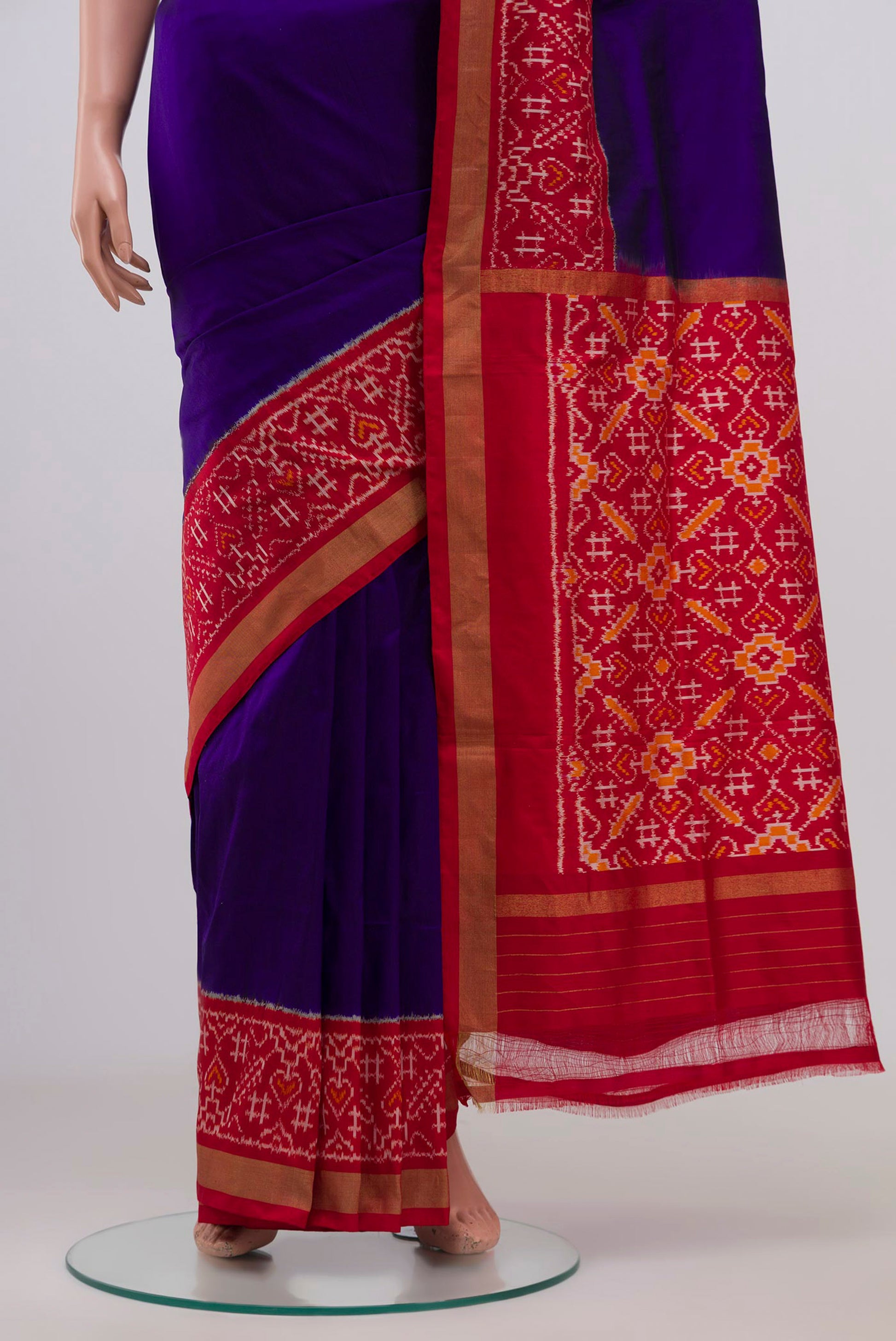 Pleats and pallu of Blue Pochampally Silk Saree with Plain Body and Ikat Border. 