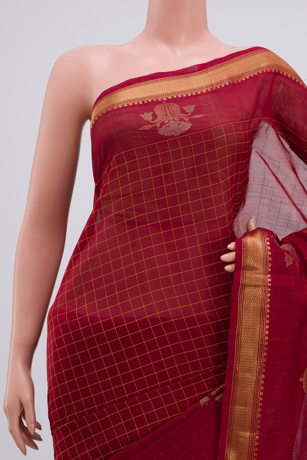 Border image of Maroon Silk Cotton Saree with Checked design on the body and Zari Border. 