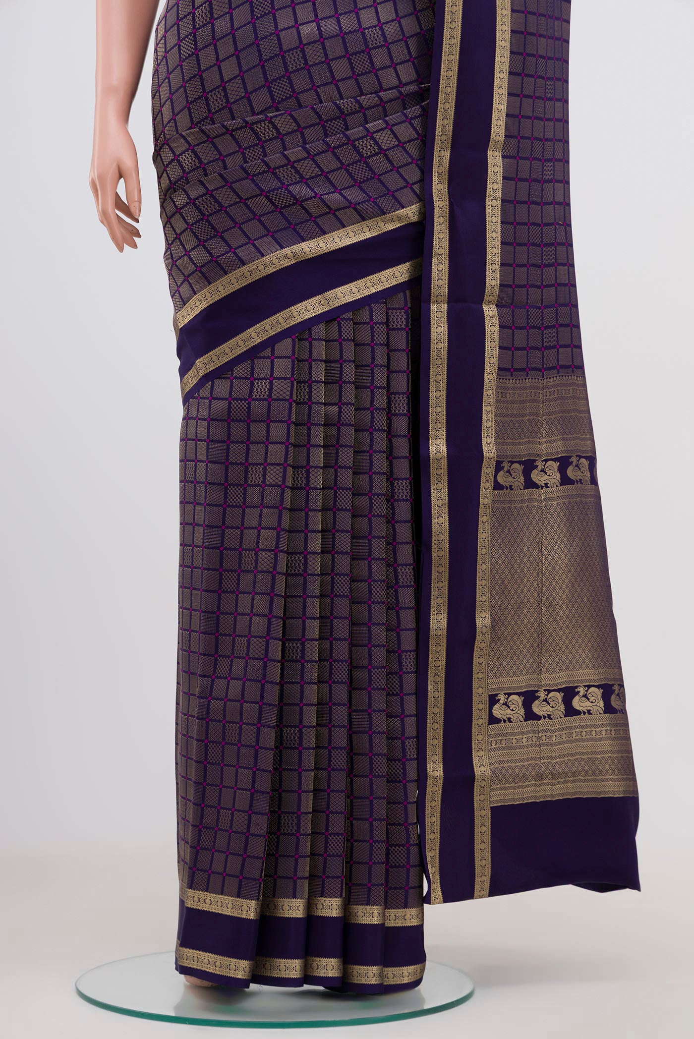 Pleats and pallu of Navy Blue Mysore Crepe Saree with Checked design on the body and Zari Border. 