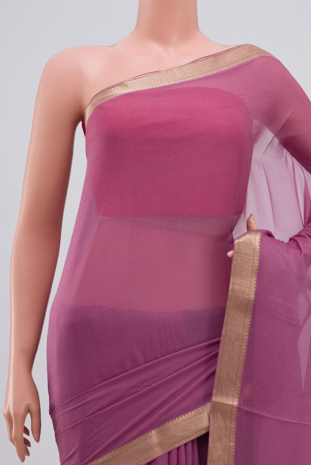 Border image of Lavender Chiffon Saree with Plain Body and Zari Border. 