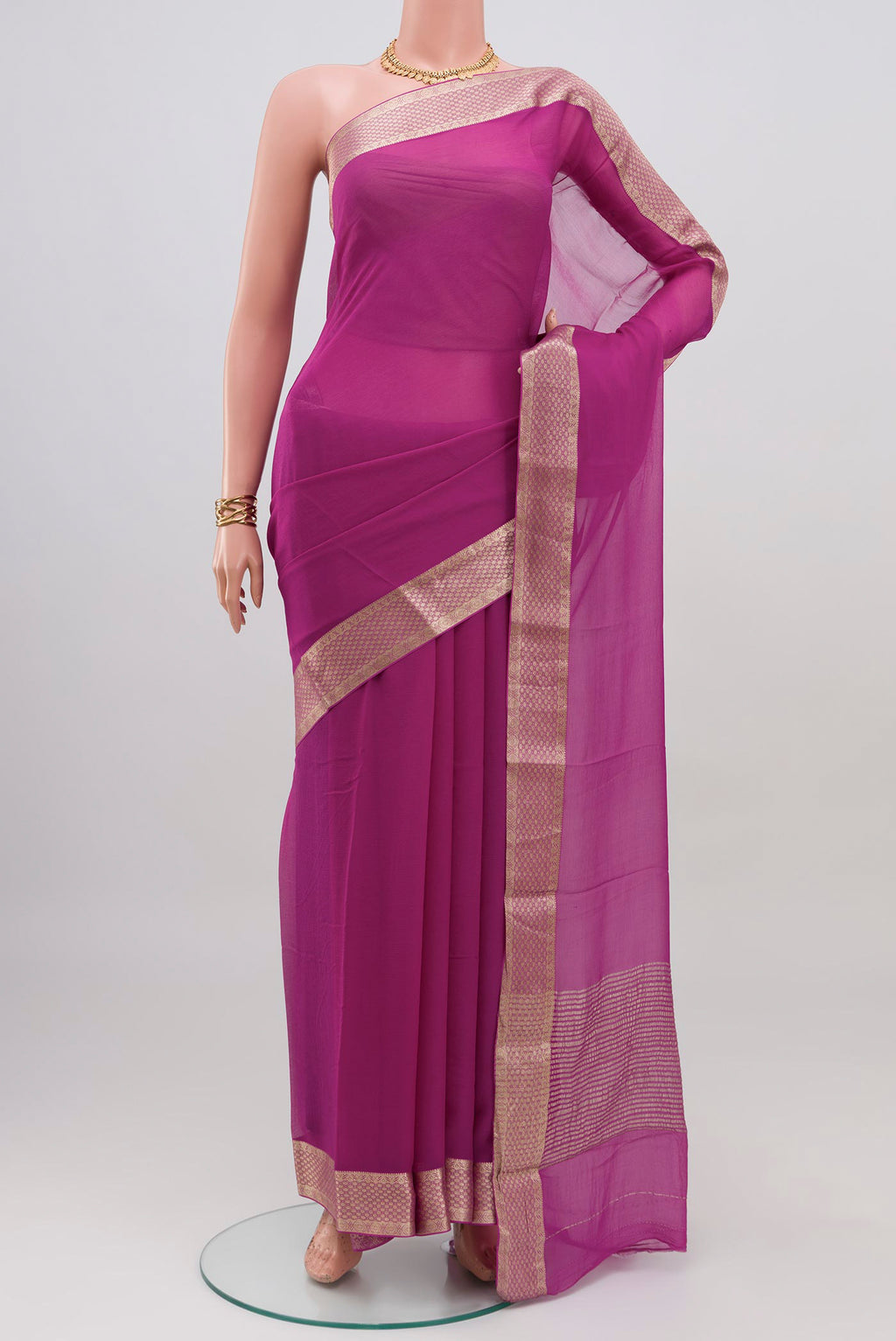 Light Magenta Mysore Chiffon Saree with Plain Body and Zari Border.  displayed on a mannequin