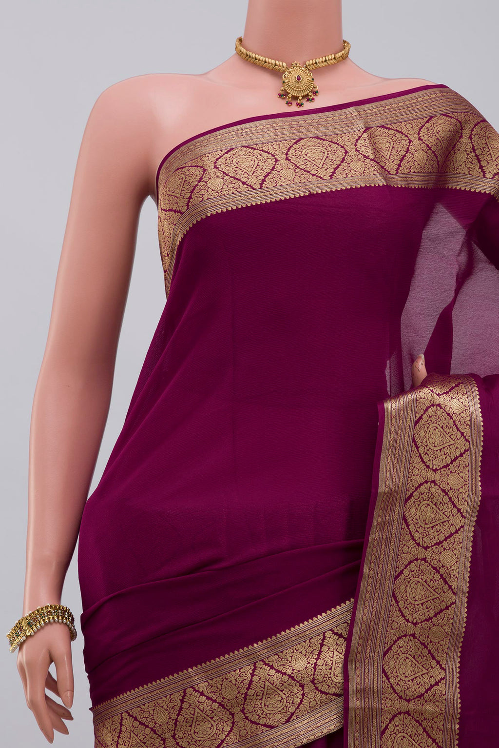 Border image of Purple Chiffon Saree with Plain Body and Zari Border. 