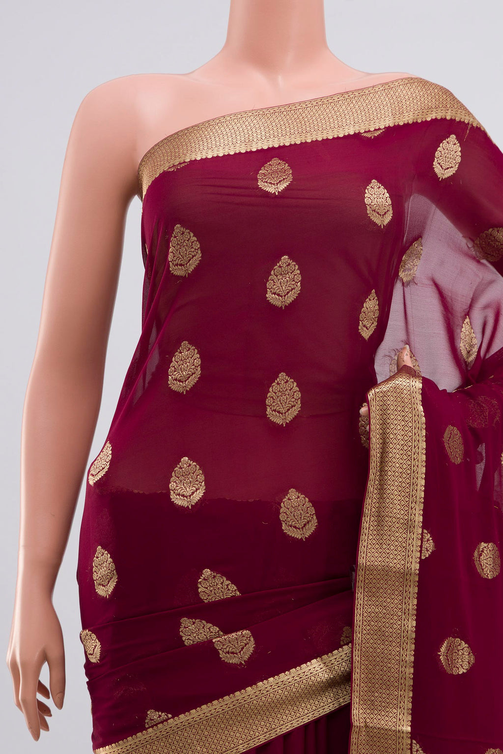 Border image of Purple Georgette Saree with Zari Butta on the body and Zari Border. 