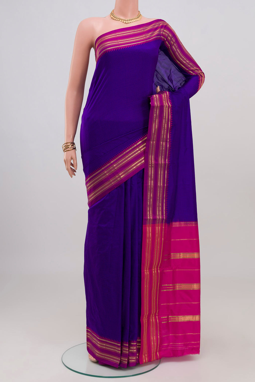 Blue Narayanpet Silk Saree with Checked design on the body and Zari Border.  displayed on a mannequin