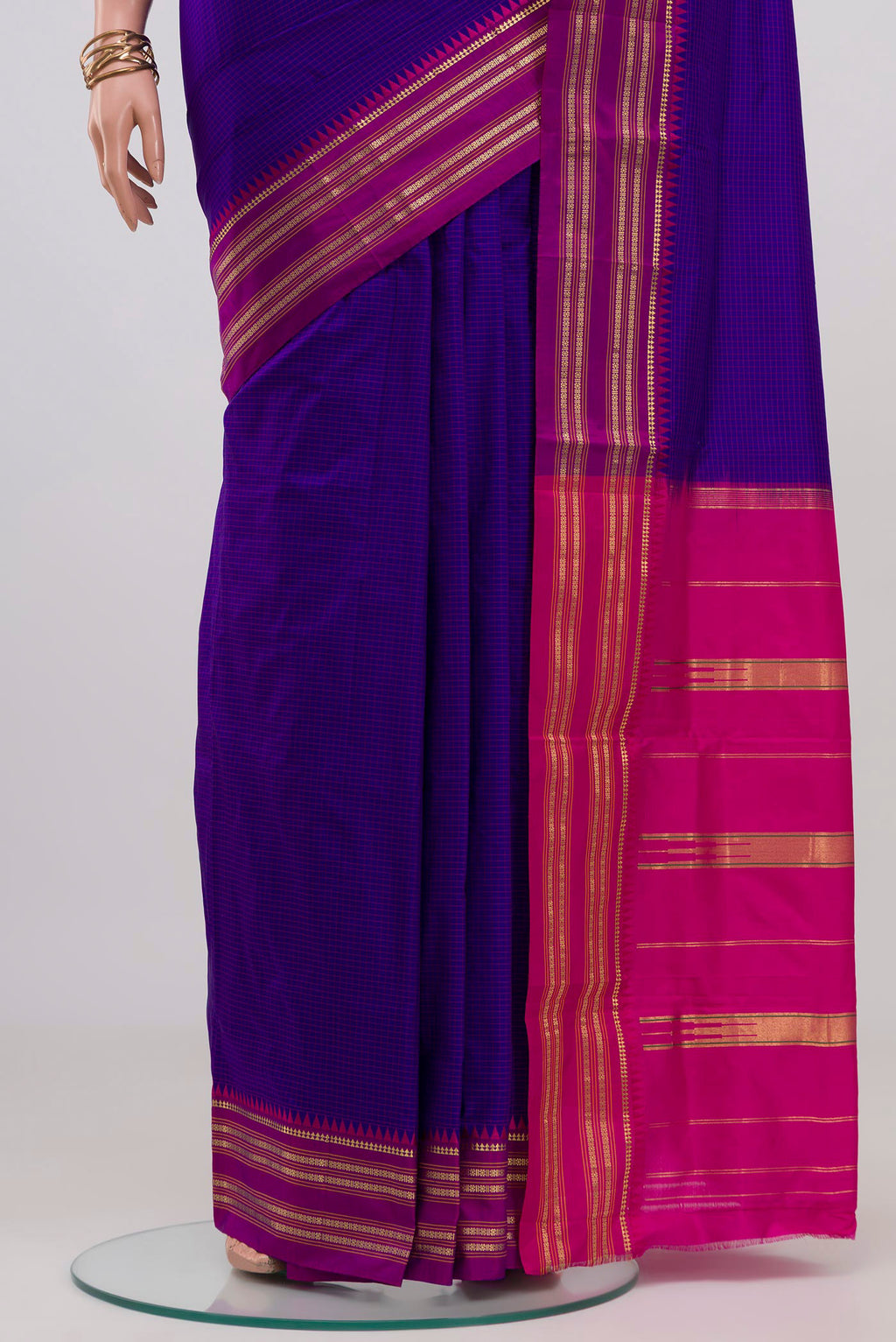 Pleats and pallu of Blue Narayanpet Silk Saree with Checked design on the body and Zari Border. 