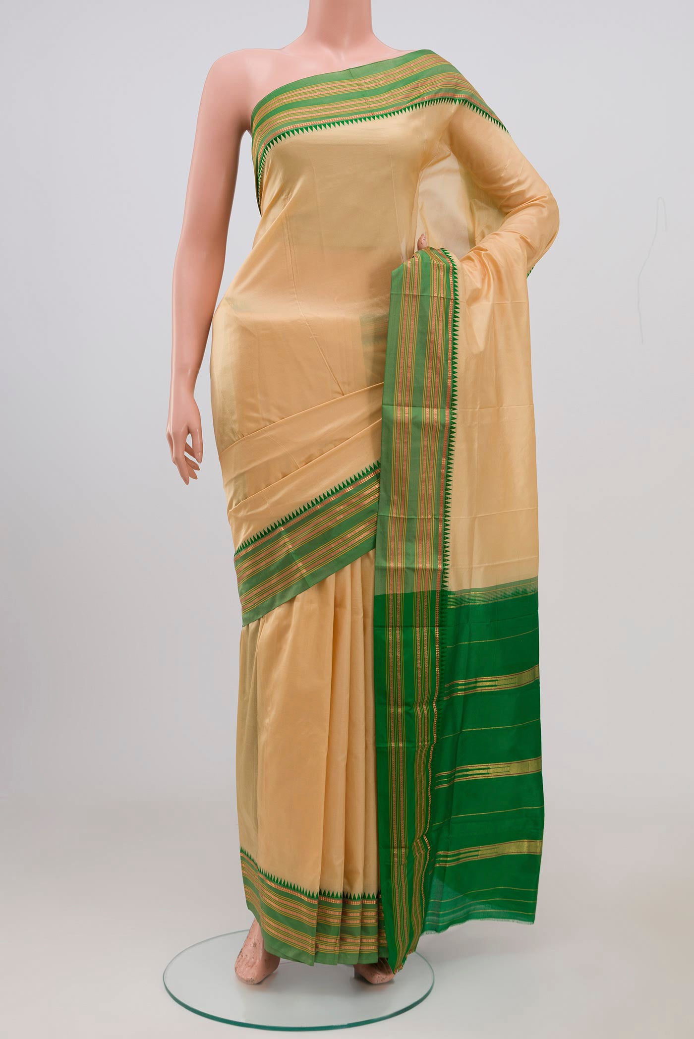 Sandal Narayanpet Silk Saree with Plain Body and Thin Zari Line.  displayed on a mannequin