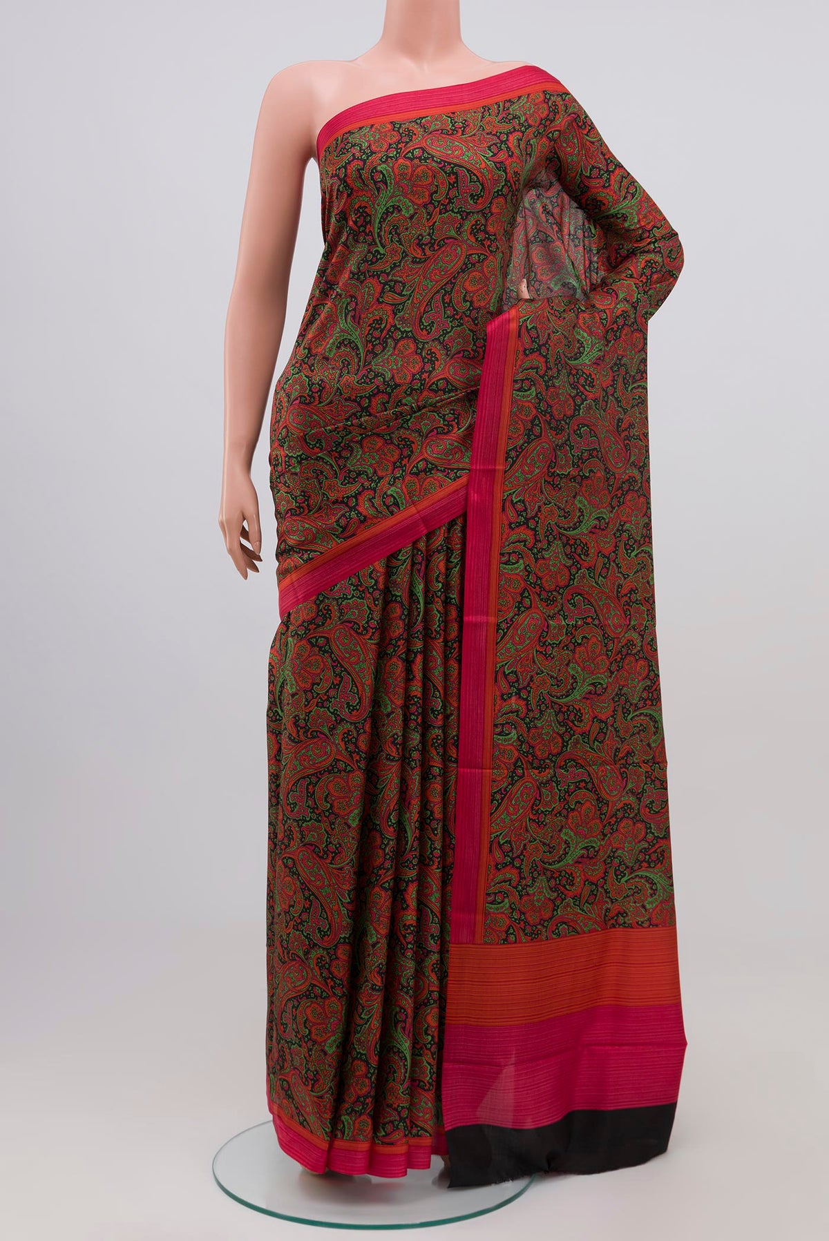 Black Printed Silk Saree with Printed design on the body and Plain Border.  displayed on a mannequin